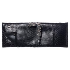 Maison Du Posh, Knuckle ring python clutch in black.