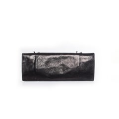 Maison Du Posh, Piercing skull clutch in black