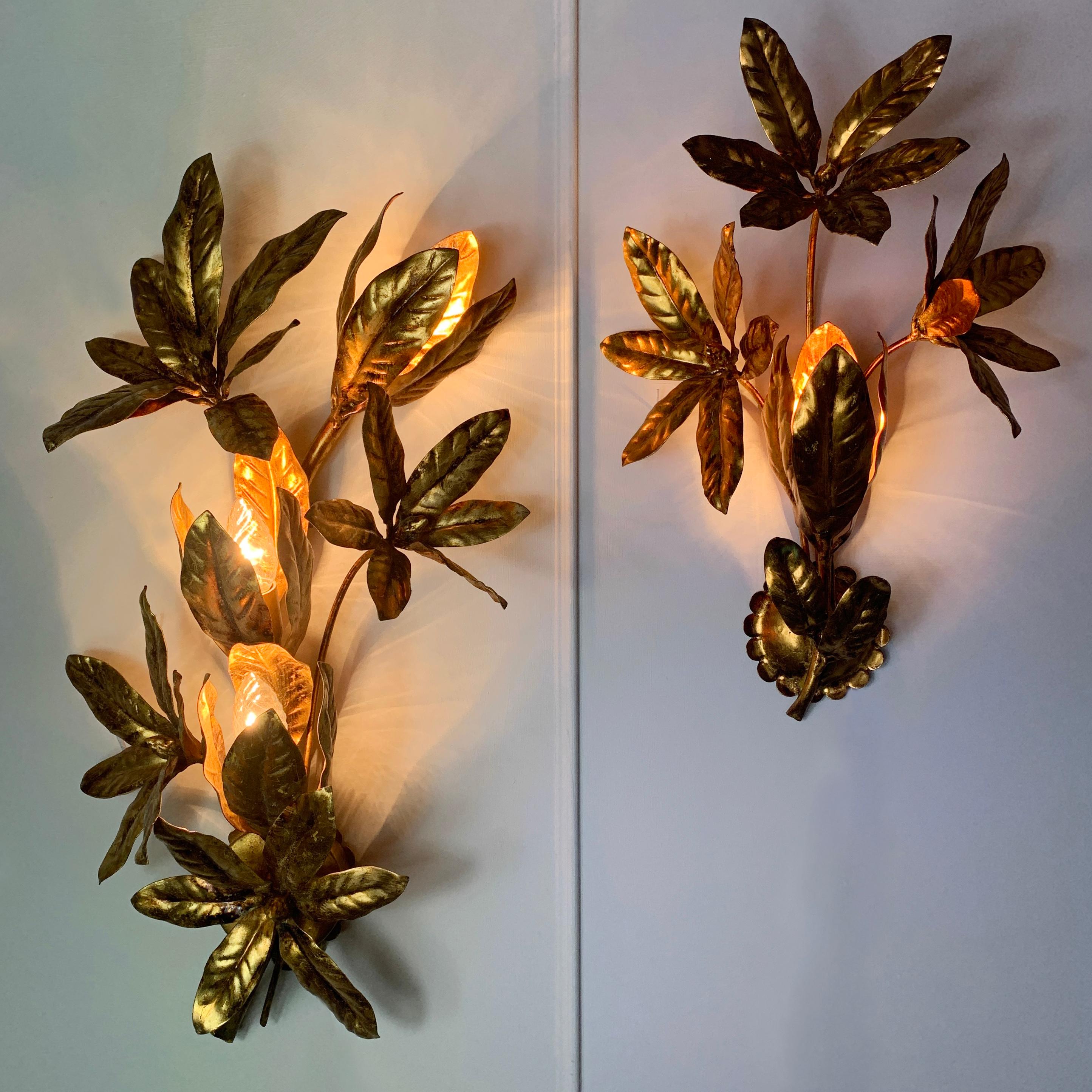 Fabulous gilt flower wall lights by 'Maison Flor Art', France, 1970s
One sconce with 3 large gilt flowers with single bulb holder hidden behind the leaves at the bottom
One sconce with 6 large gilt flowers with 3 bulb holders hidden behind the