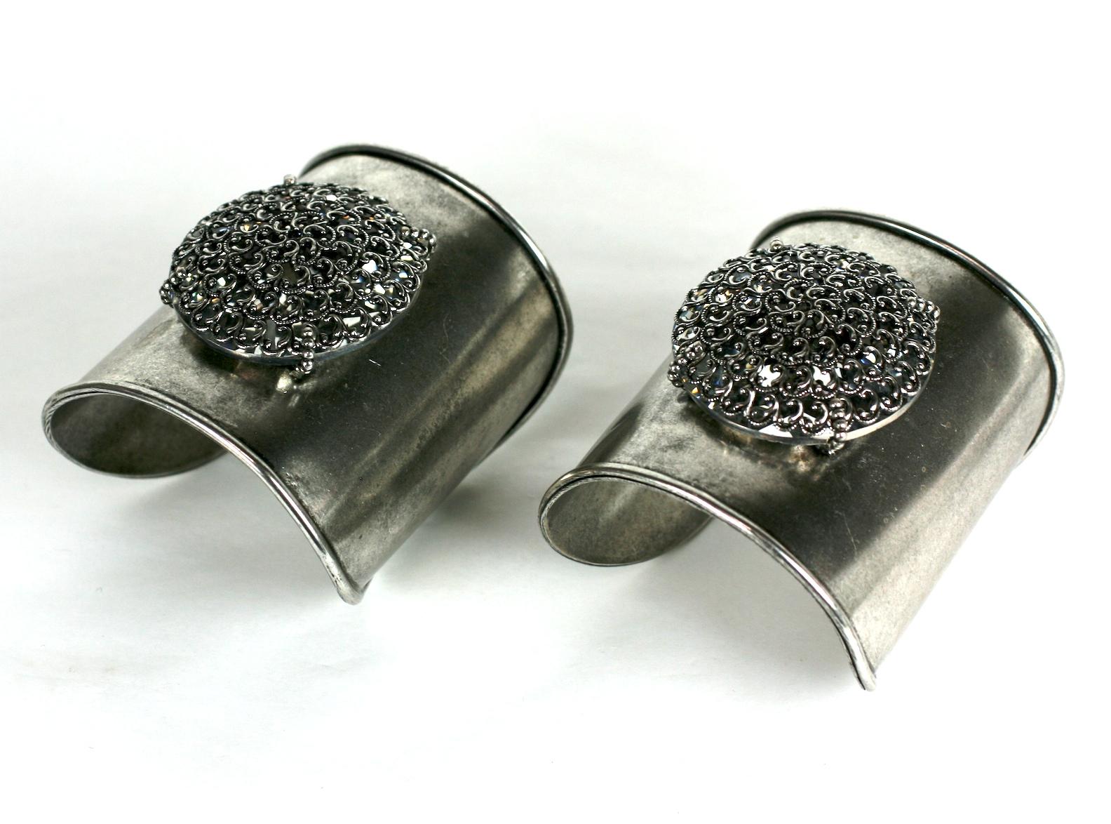 Important Maison Goossens for Yves Saint Laurent artisan crystal cuffs. Hand crafted of antiqued silver plated bronze with huge faceted round crystals, each caged under an intricate pierced filigree dome. Very striking and chic, yet subtle as the