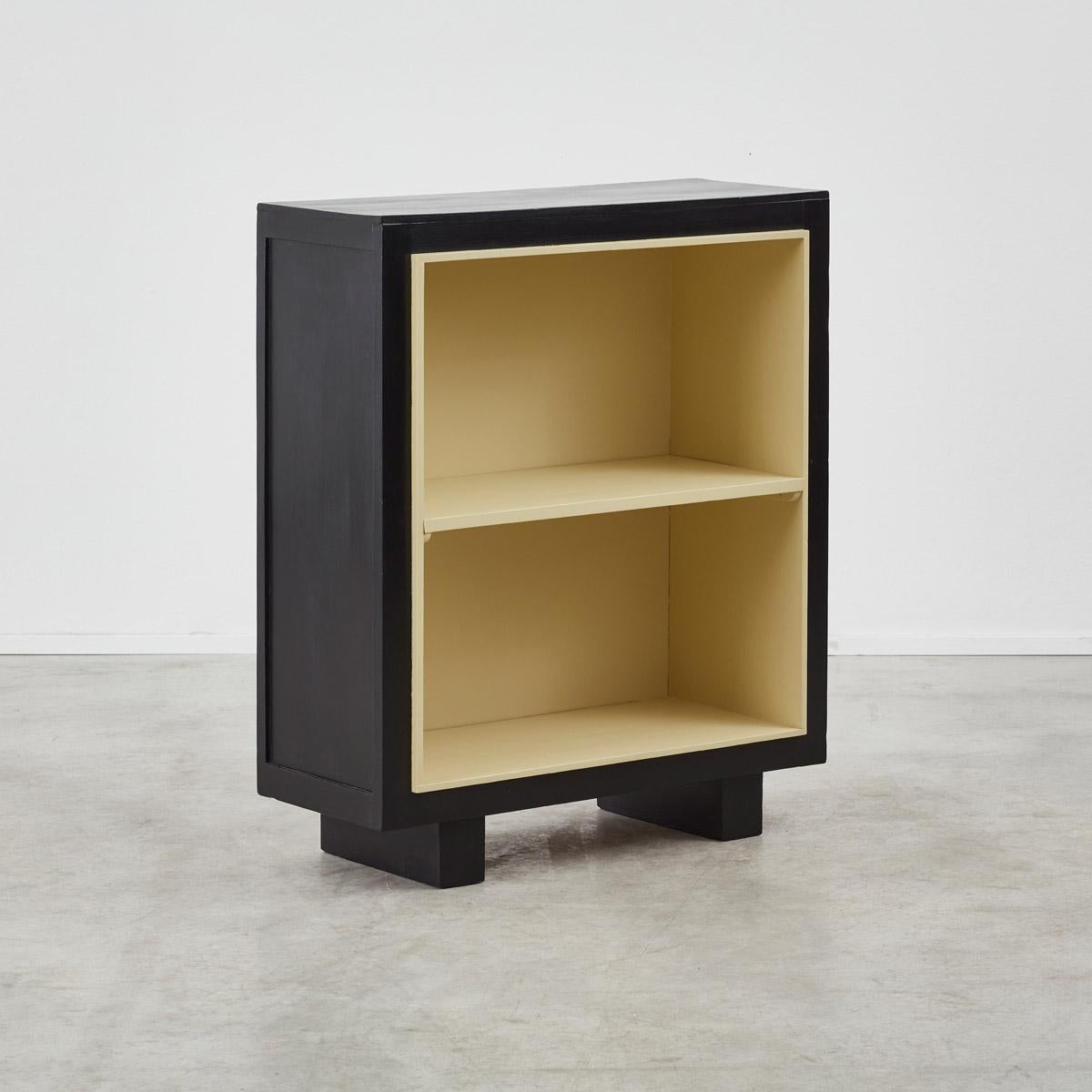 Bold and striking, this open cabinet exudes the charm of the Art Deco movement. Designed by the highly regarded furniture manufacturer Maison Gouffé, known for their training and manufacturing Jean Royere. Featuring two compartments, the cabinet has