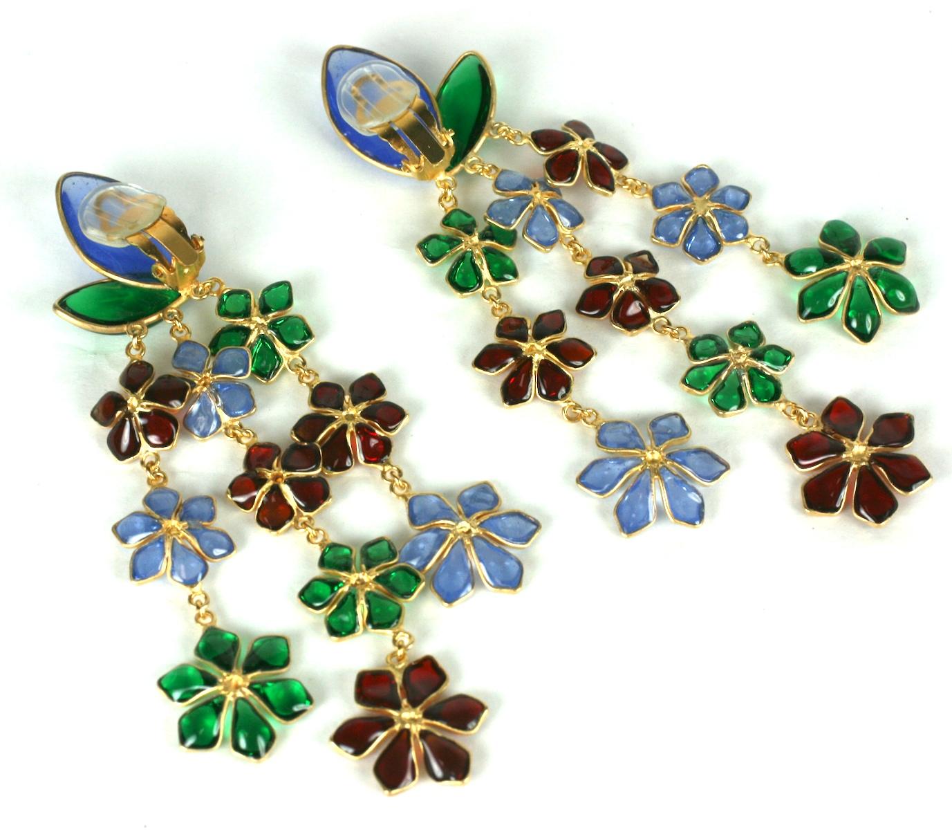 Exceptional Maison Gripoix Anglo Indian inspired long floral cascade ear clips. Of faux emerald, ruby, and pale sapphire poured glass enamel graduated flower heads set in fine glit metal frames. The impressively long earrings has clip back fittings