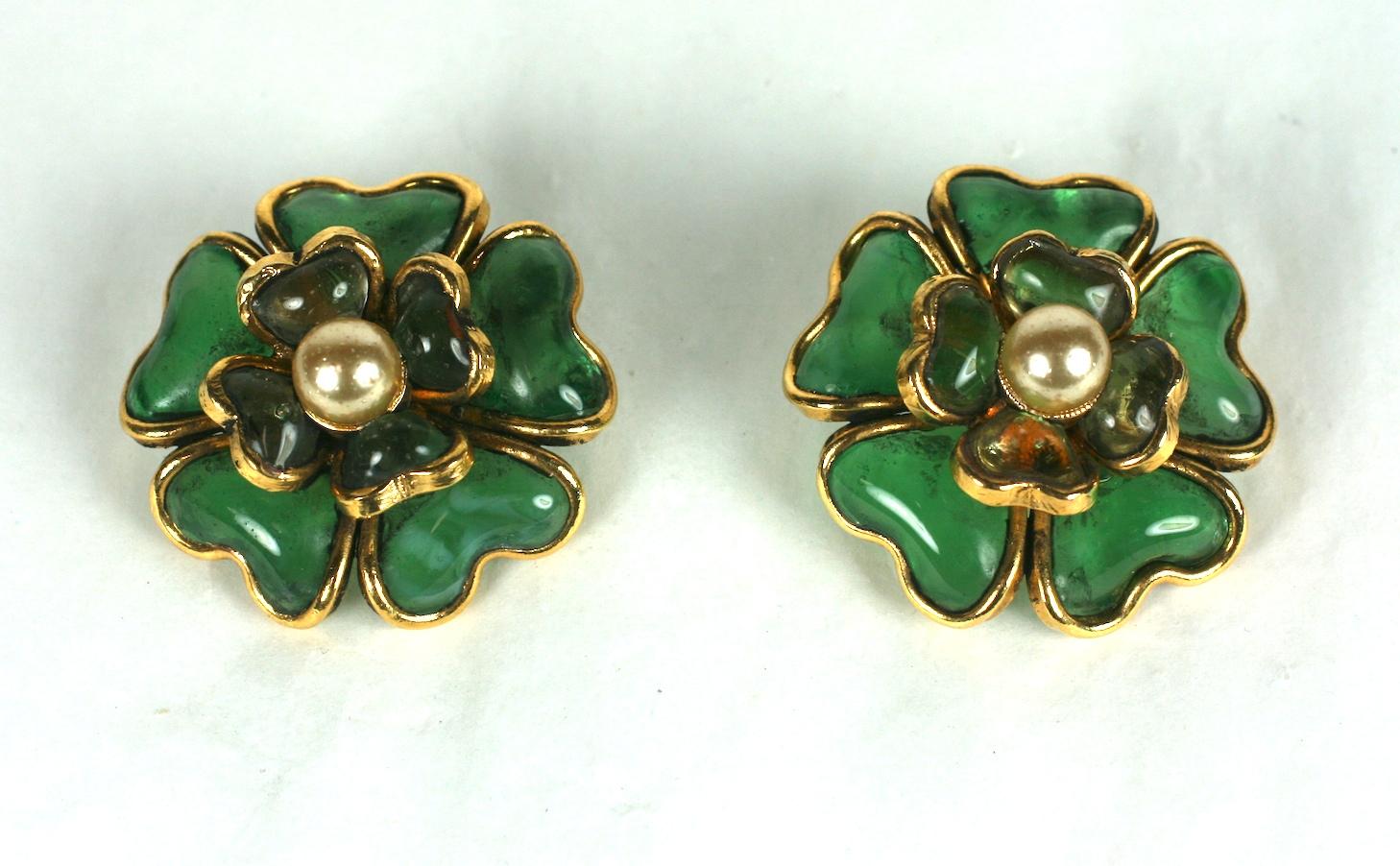 Chanel by Maison Gripoix  pale emerald green signature poured glass enamel and faux pearl nacre cabochon Camelia ear clips. Settings of hand made gilt bronze wire work. 1990's France. 
Excellent Condition , Unsigned Chanel runway sample.
Length  1