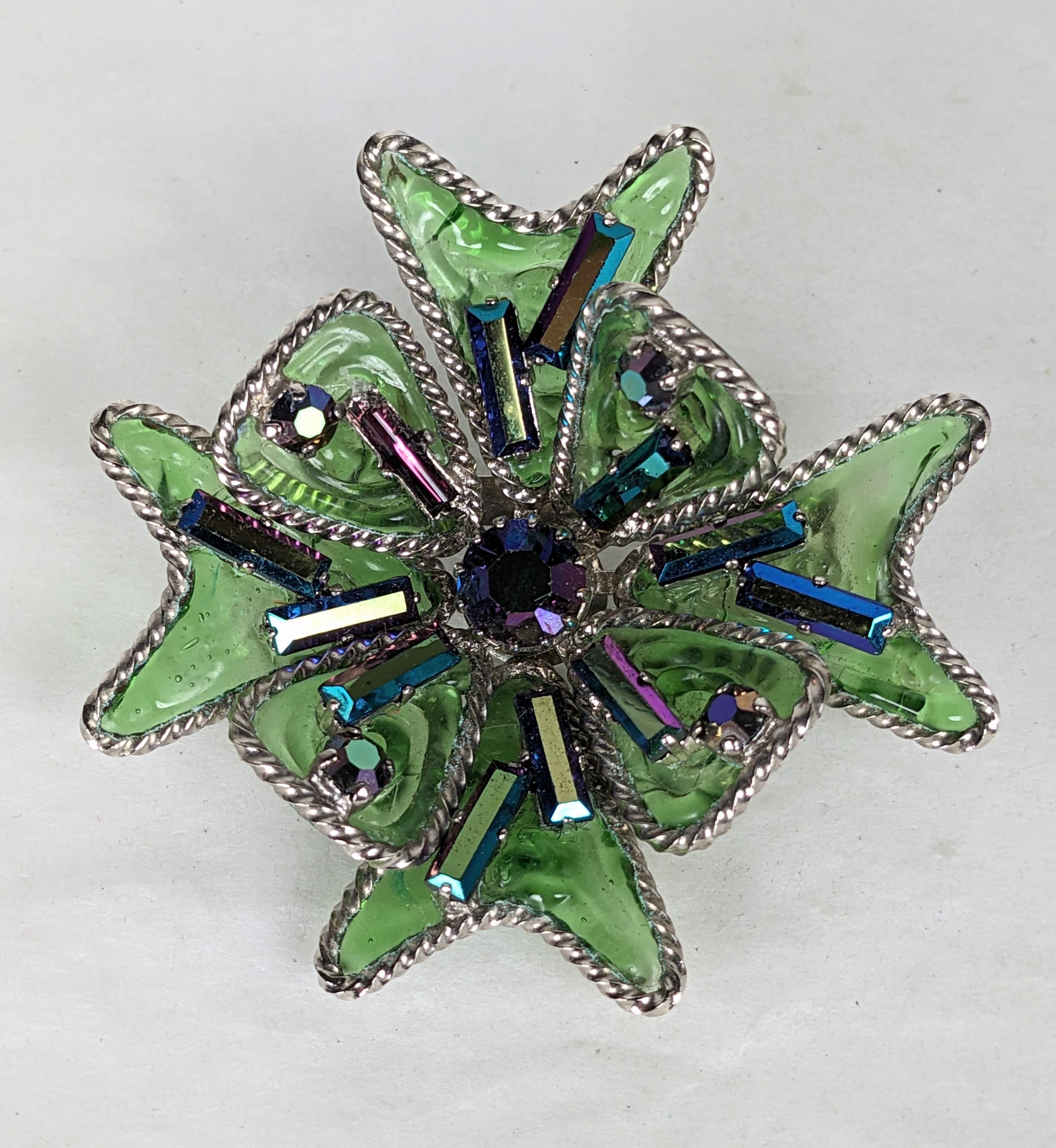 Maison Gripoix Emerald and Aurora Maltese Cross from the 1950's. Emerald poured glass is adorned with settings which hold aurora crystal stones. 2.25