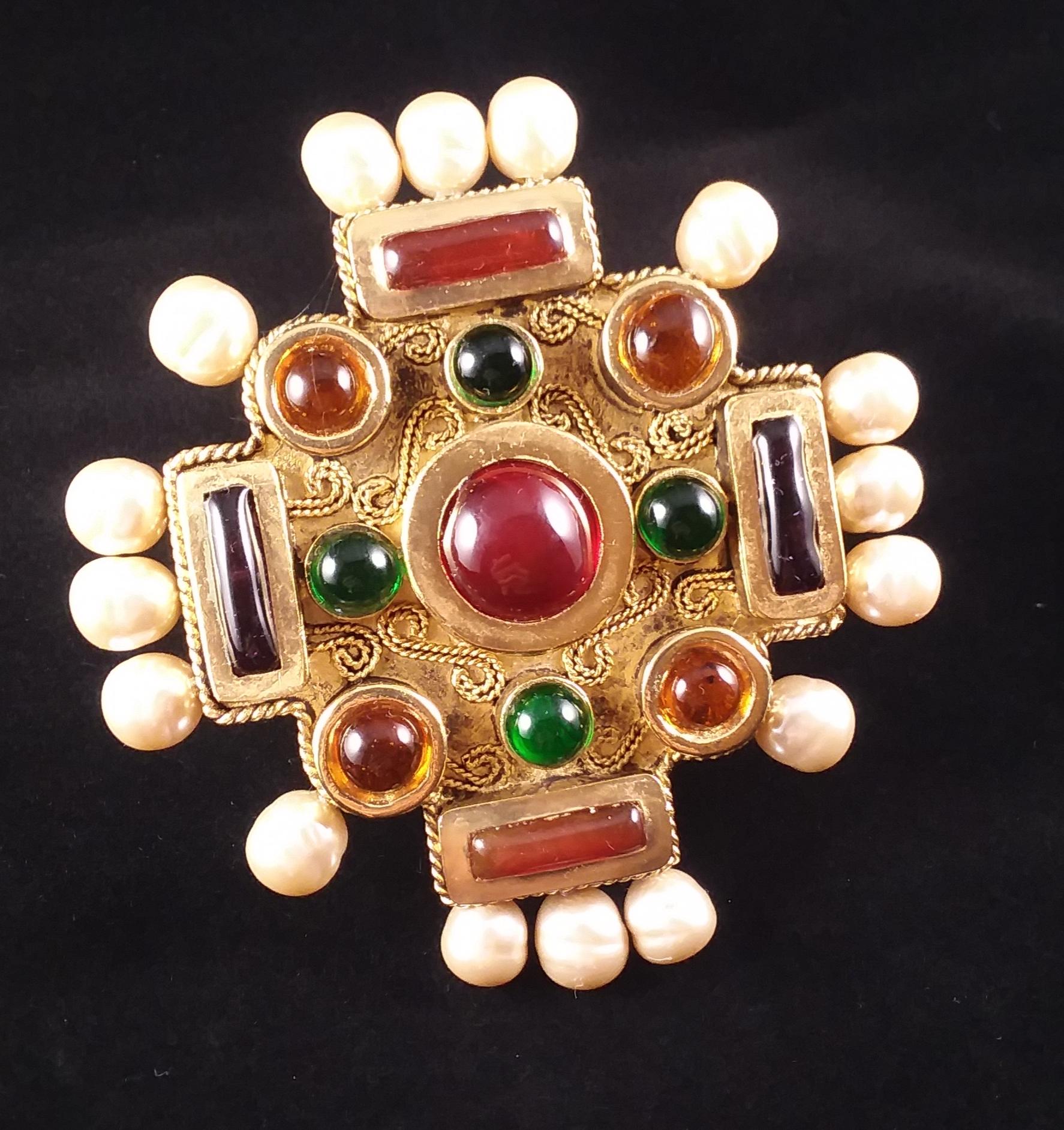 Rare, enormous Maison Gripoix for Chanel Byzantine Cruciform cuff bracelet. The symmetrical squared oversized cruciform cuff is composed of ruby, emerald, amythest and citrine poured glass pate de verre enamel cabochons which decorate the central