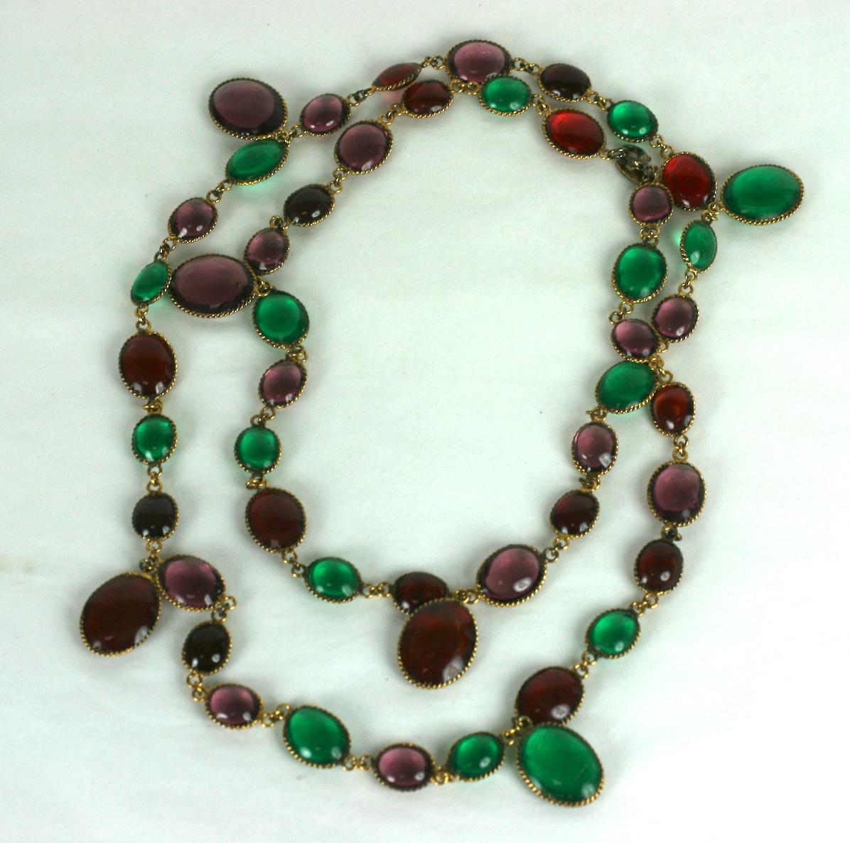 Maison Gripoix for Chanel pastille drop long necklace of deep ruby, emerald and amythest oval hand made stations in signature Gripoix poured glass enamel. Sautoir is handmade of fine braided wire and designed to be layered and wrapped around neck.