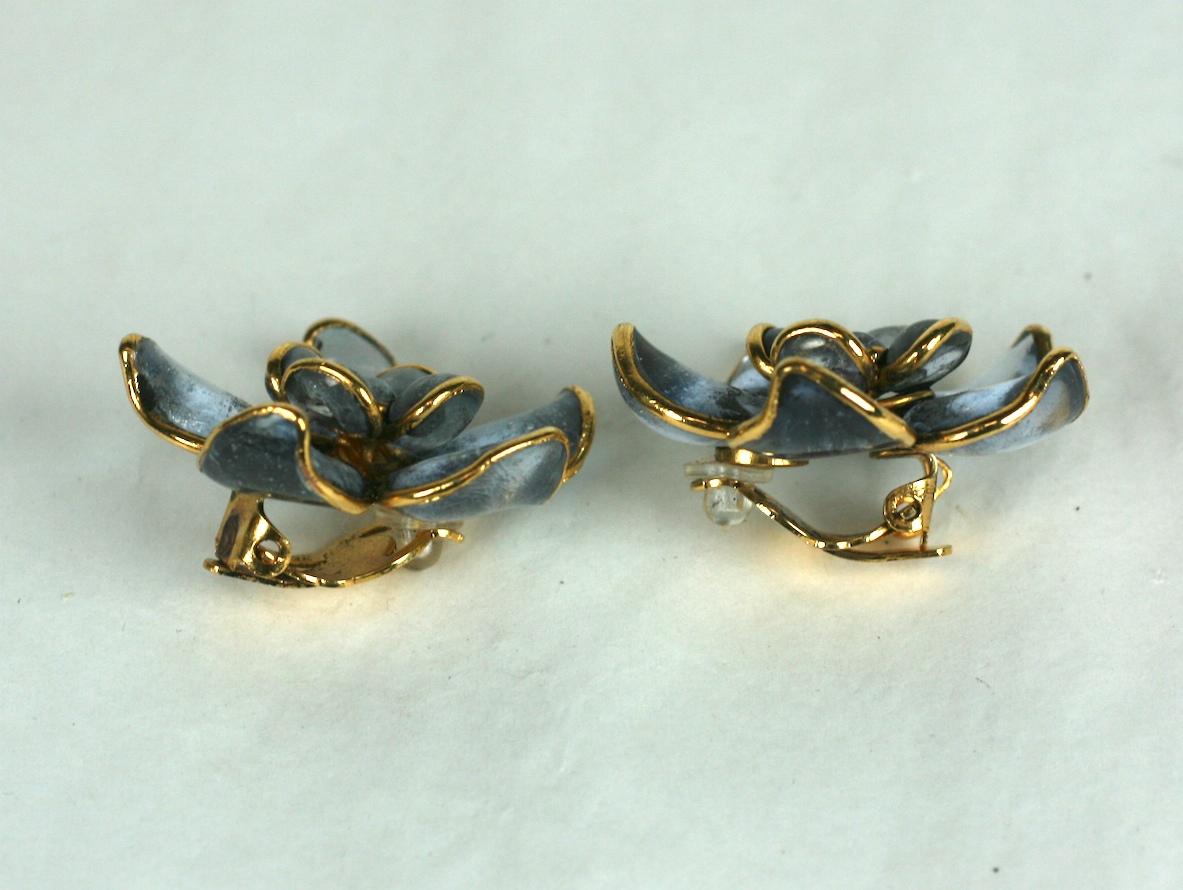 Maison Gripoix for Chanel soft sapphire signature poured glass Camellia ear clips. Settings of hand made gilt bronze circa 1980's. Maison Chanel's flower ear clips of the 1980s and 90s harken back to her romantic Period of 1938/39 in establishing 