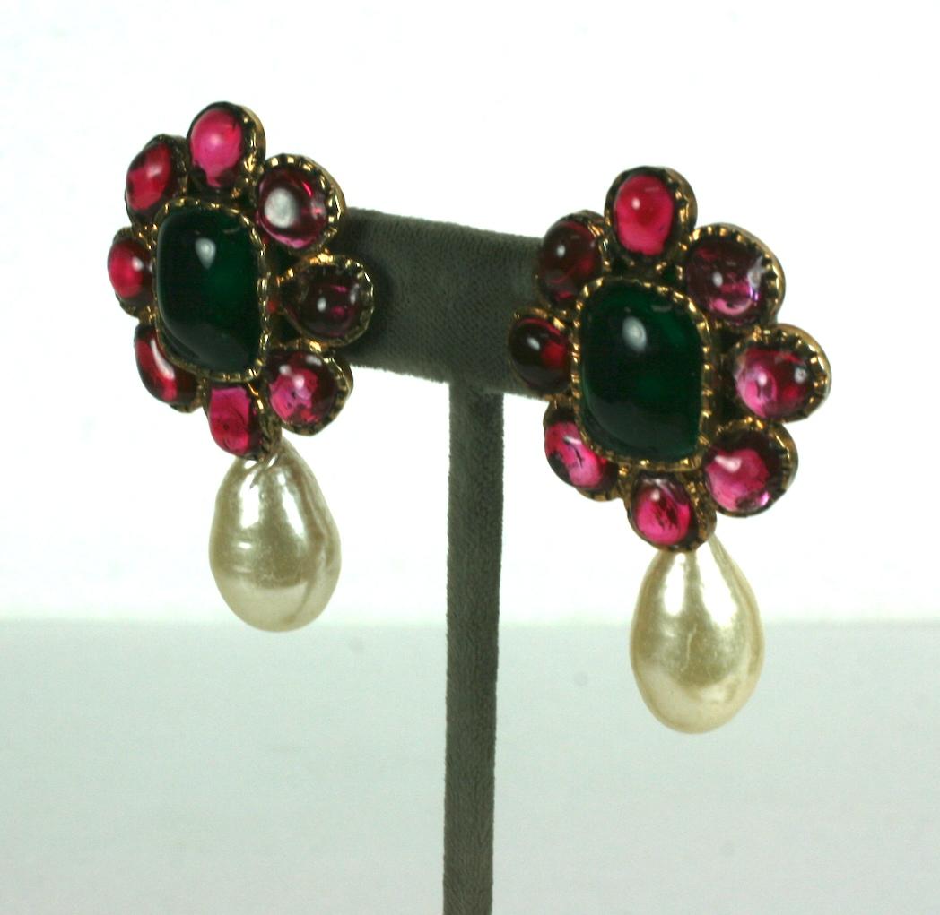 Maison Gripoix for Chanel classic Renaissance style earrings with ruby and emerald poured glass enamel and handmade faux baroque pearl.  Set in gilt hand hammered bronze. Clip back fittings.
Excellent condition, Signed. 
2
