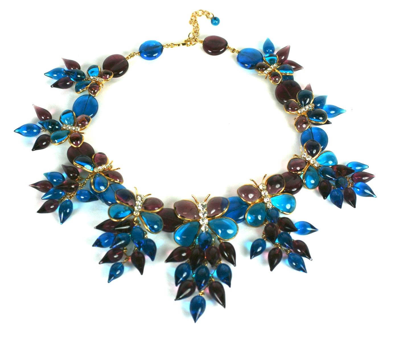 Large and Important Maison Gripoix for Yves Saint Laurent butterfly bib necklace circa 1970. Of amythest and deep aquamarine Gripoix poured glass enamel. Composed of asymmetrically color blocked butterflies with crystal rhinestone accents. Falling