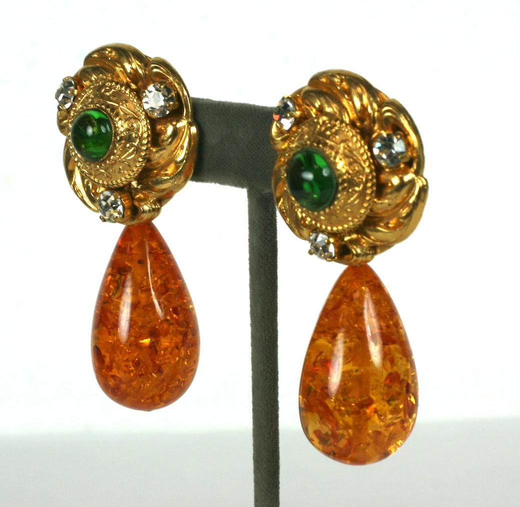 Imposing Yves Saint Laurent long drop earrings with emerald poured glass by Maison Gripoix and crystals set in baroque gilt filigree with a large reconstituted amber drop. Clip back fittings. 
1980's France, Unsigned Runway earrings. 
1.25