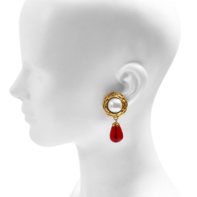 Maison Gripoix Vintage Faux Pearl and Red Dangling Earrings. Wrapped in woven gold around the Pearl in the typical 1980s style of Chanel. Clip on. So classic and you always look good no matter what you are wearing when you have these on. Clip