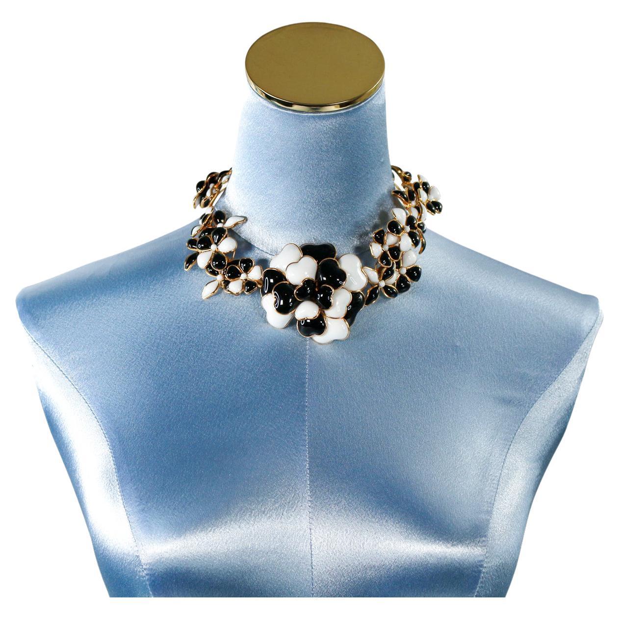 VIntage Gripoix Gold Tone with Black and White Flowers Collar.  It is  a very classic style that will look good with a ballgown or on a t-shirt. Always classic with an edge.  It isfrom 1