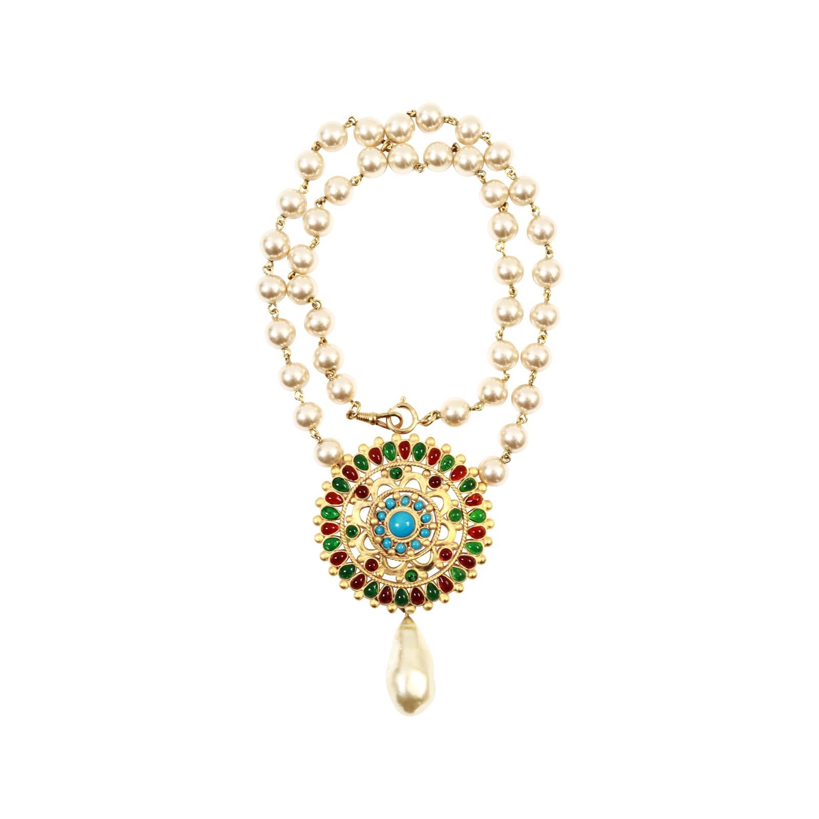Maison Gripoix Vintage Necklace with Multi Color Dangling Pearl.  Pearl Necklace with Gripoix Disc in Gold Color with Dangling Pearl. If you needed this longer a jeweler could easily add gold chain to lengthen it.

Guy de Maupassant wrote a famous