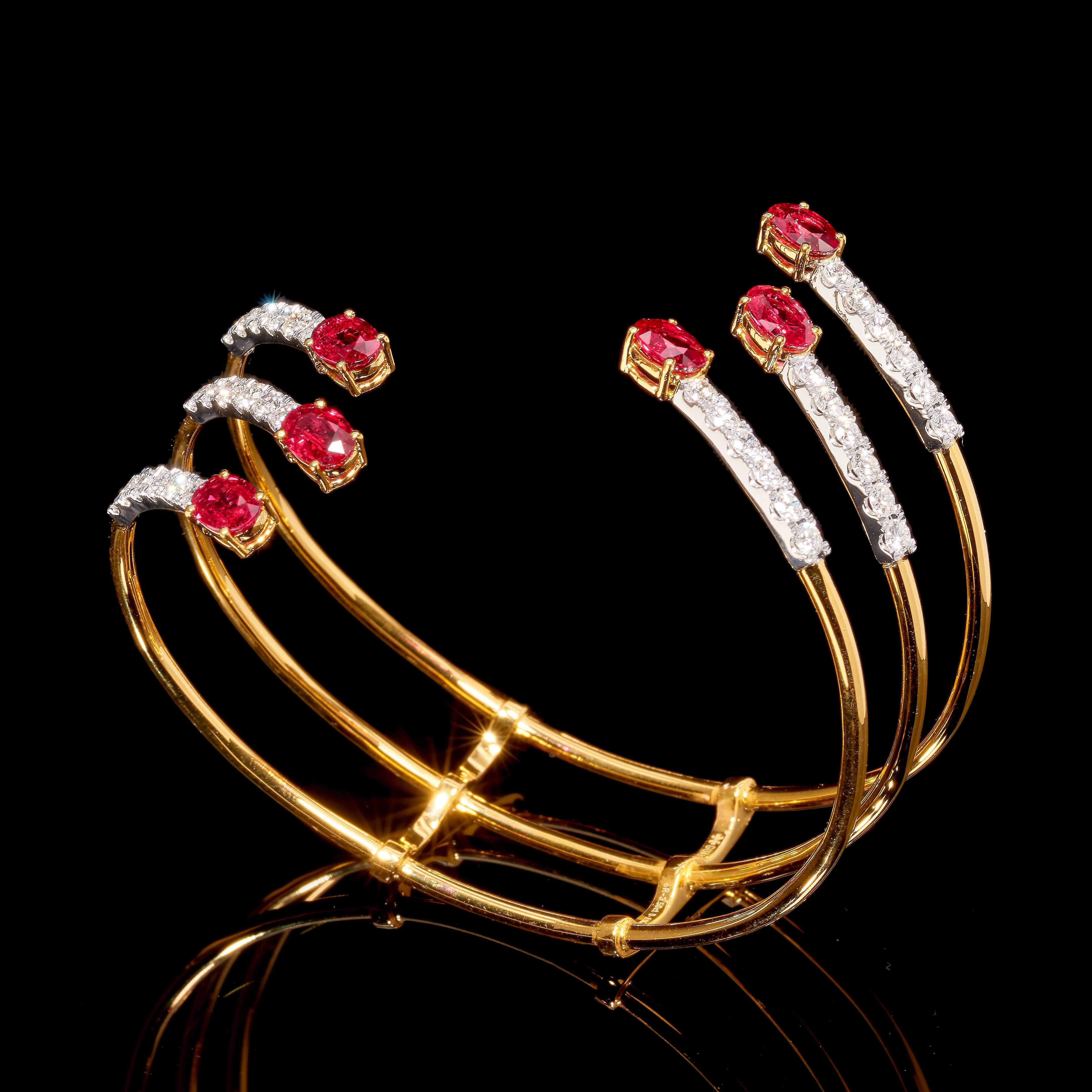 3-prong bracelet 

6 Rubies (3.5cts), 36 Diamonds (2cts), 18K Yellow & White Gold.
Size: 56x46mm

Six pieces of unheated rubies set on a background of sparkling white diamond will capture the eyes of everyone.