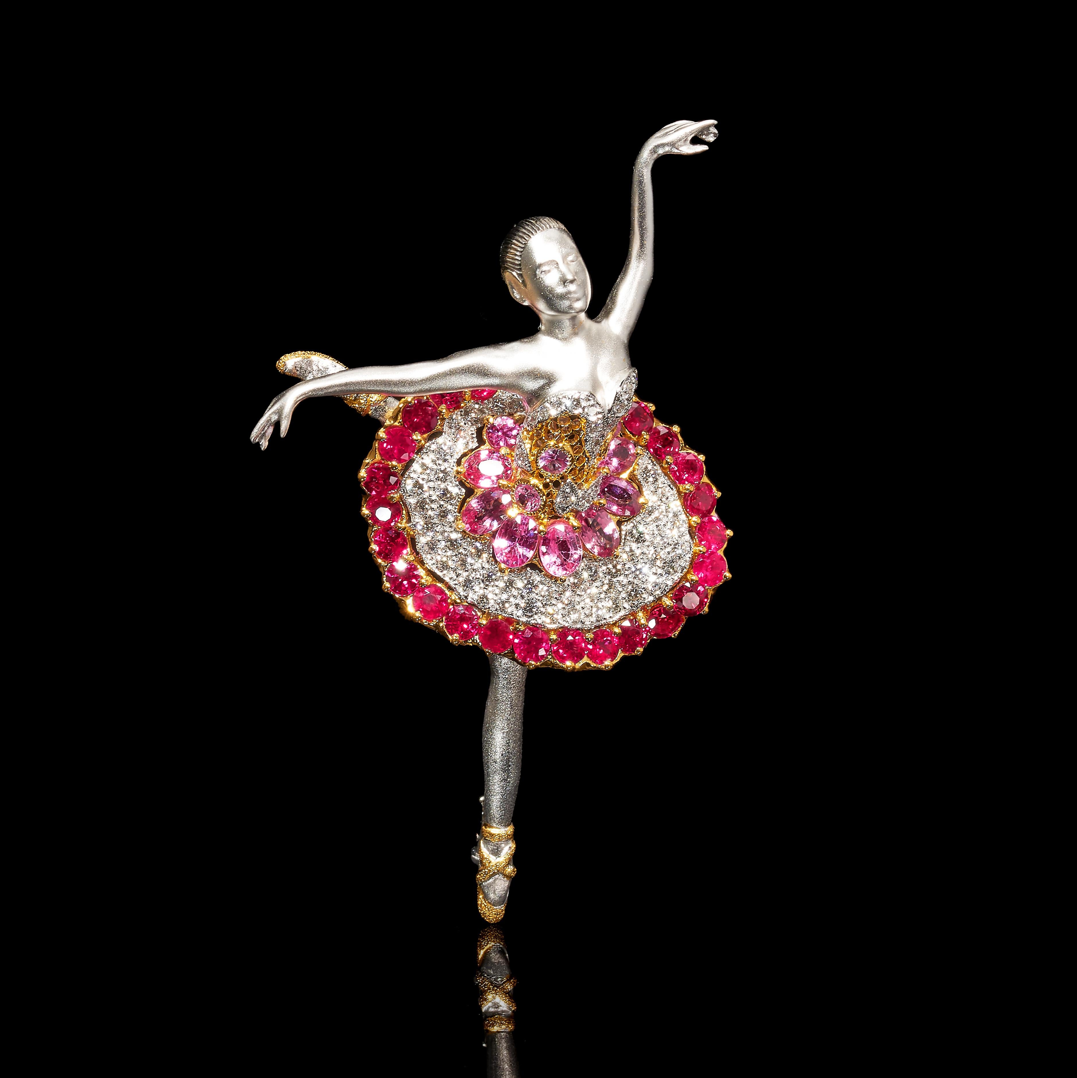 Swan Lake 

24 Rubies (3.145cts), 12 Pink Sapphires (2.413cts), 69 Diamonds (1.11cts), 18K Yellow & White Gold.
Length: 72mm