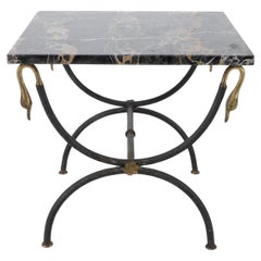 Maison Jansen. A black marble top with gold and silver veins coffee table