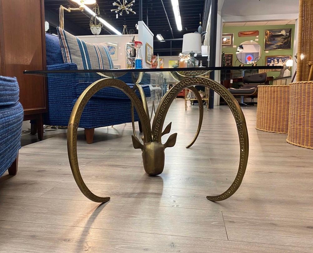 Maison Jansen and Chervet Style Brass Rams Head Glass Cocktail Coffee Table In Good Condition In West Hartford, CT