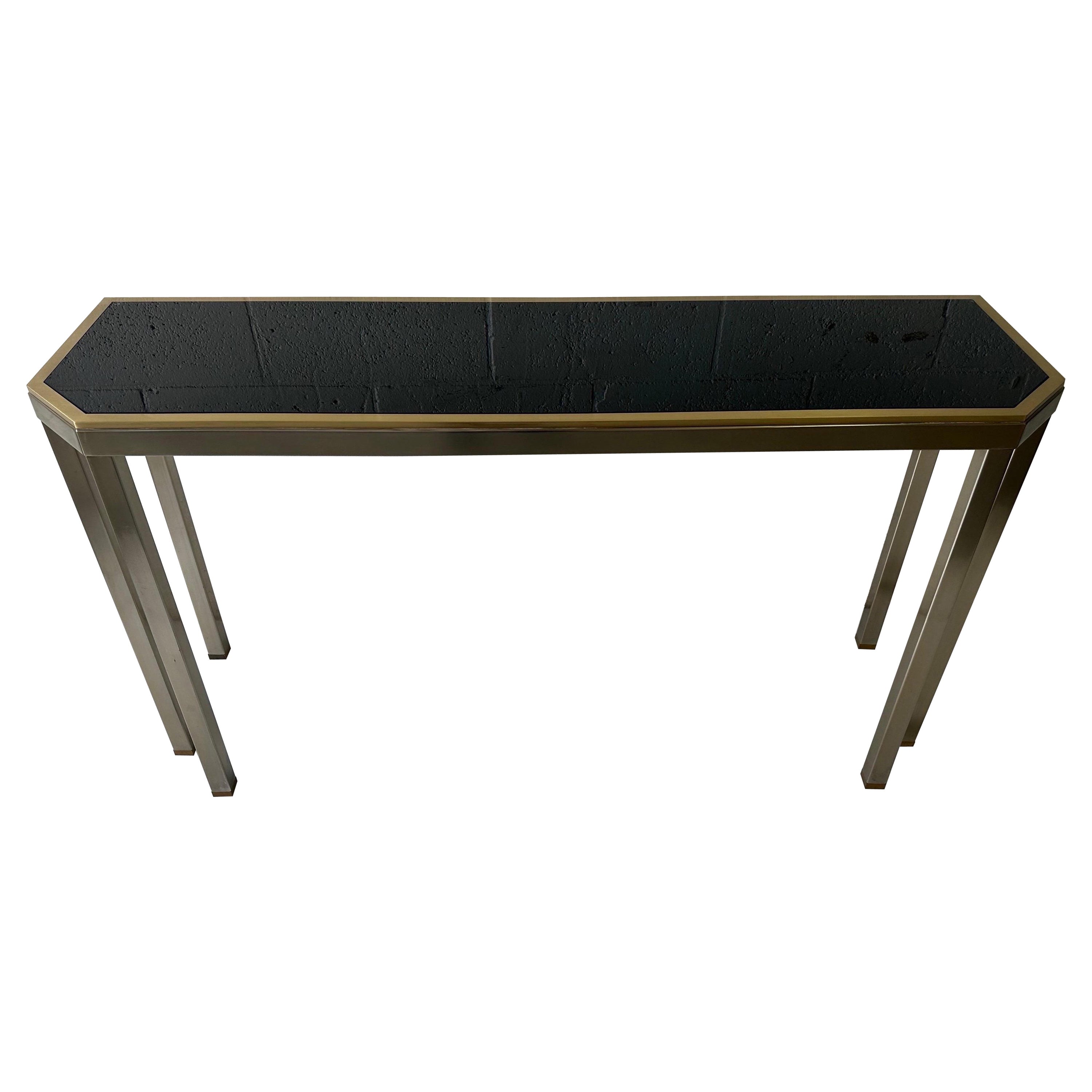 Console de 6 pieds Maison Jansen et Guy Lefevre en acier brossé et opaline noire
Lourd et robuste, qualité et finition superbes.