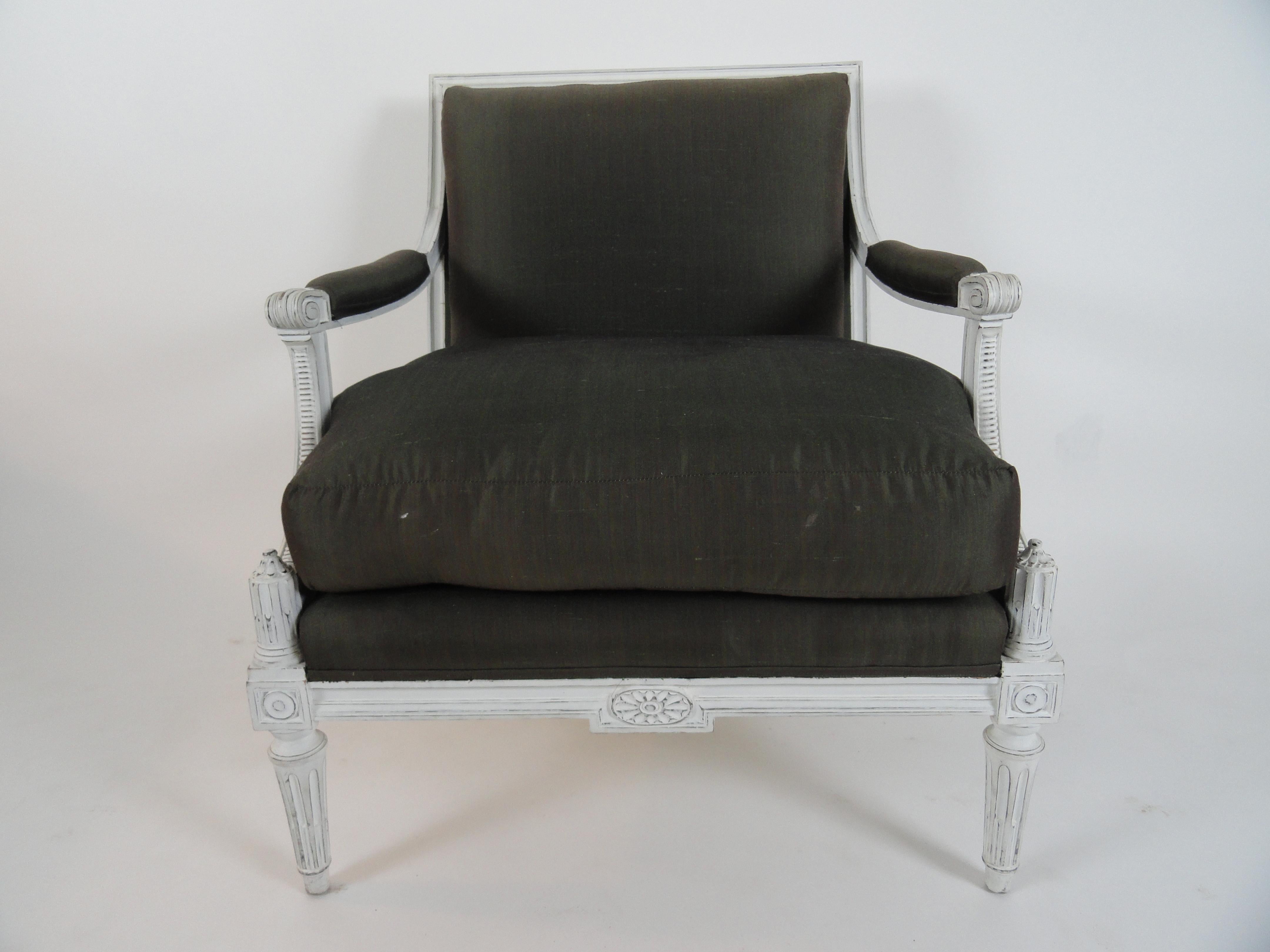 Maison Jansen Louis XVI style armchair or fauteuil. Wood painted white. Newer, distress finish. Upholstered in Henry Calvin Athena taffeta (50% silk, 50% cotton). Comfortable.