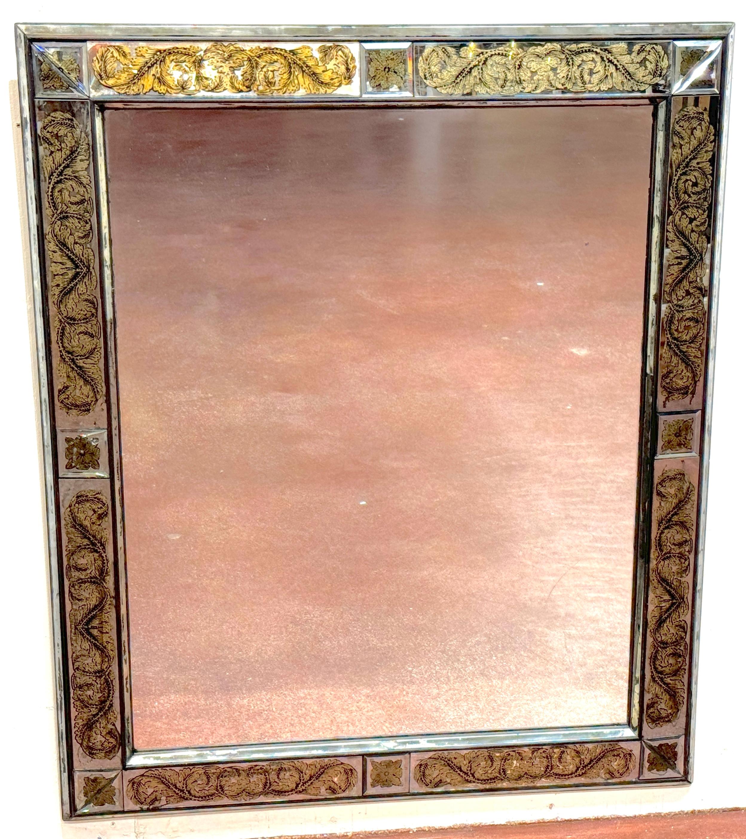 Maison Jansen (Attribué) Miroir floral et treillis néoclassique églomisé et doré
France, milieu du XXe siècle
Dimensions : Ensemble : 47