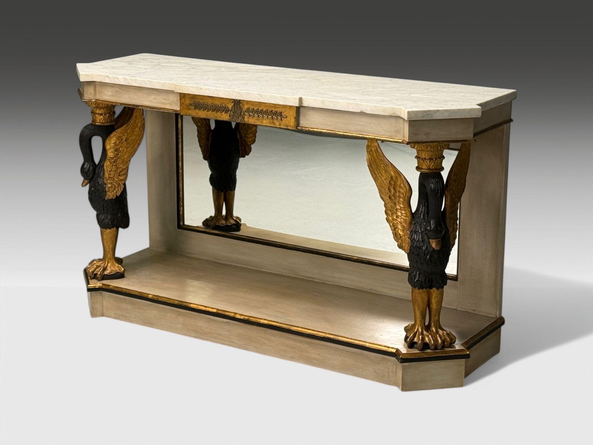 Maison Jansen attr., Hollywood Regency, Giltwood, Marble, Mirrored Console Table, France, 1940s

A Hollywood Regency-style French console attributed to Maison Jansen featuring finely carved swans supporting a thick white marble top. The case is