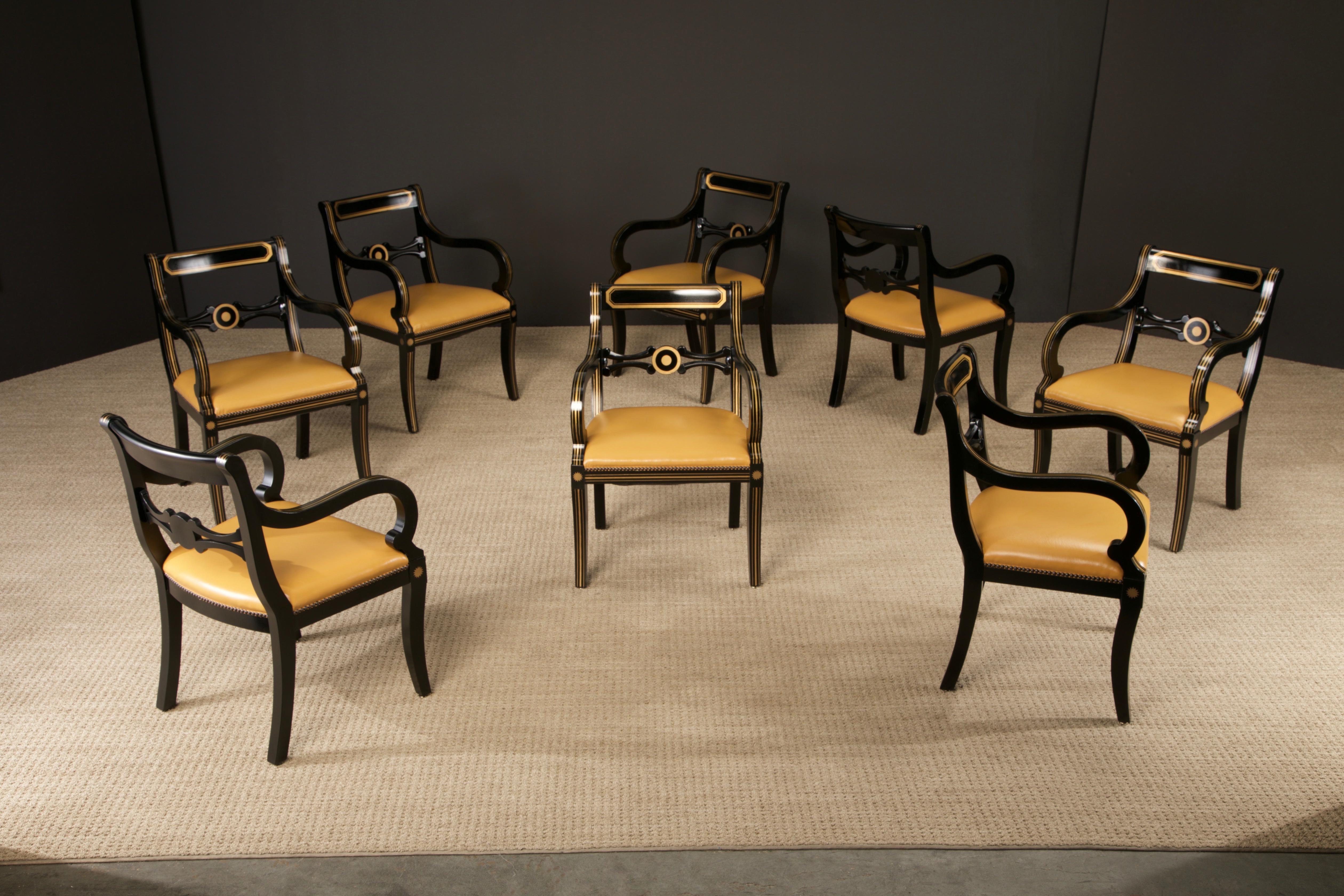An intriguing set of restored armchairs, which are confirmed to be from the 1940s and earlier. The question is - how much earlier? Crafted in the Regency style, this set of Ebonized and Gilt frames chairs feature gold colored leather seats and a