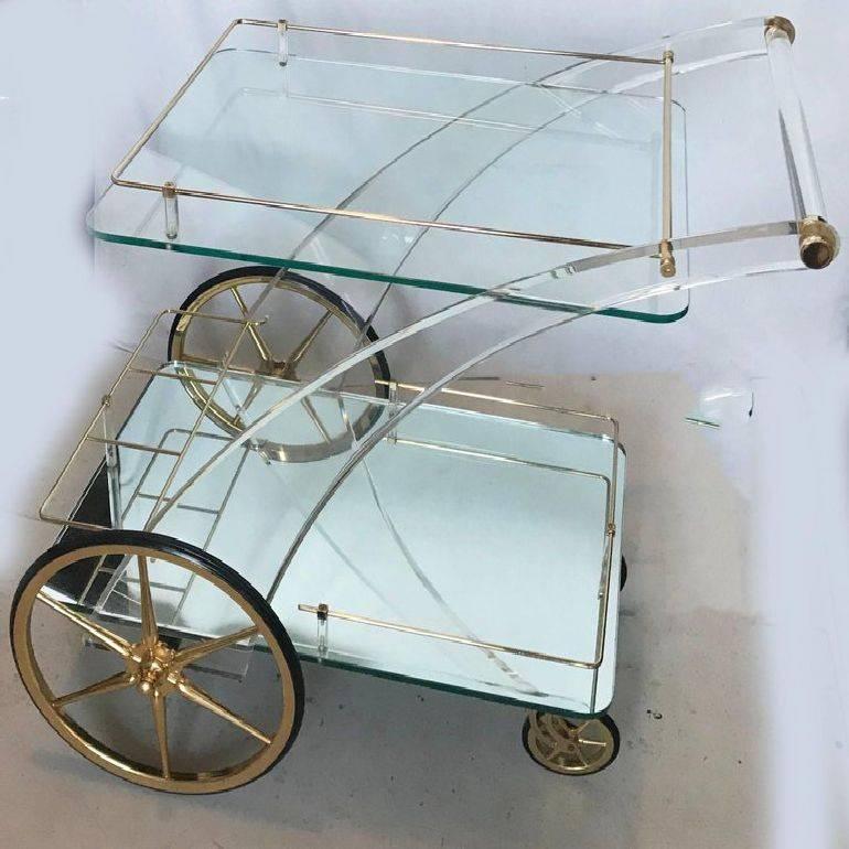 Superb Lucite, mirrors and glass Maison Jansen two-tier bar cart.