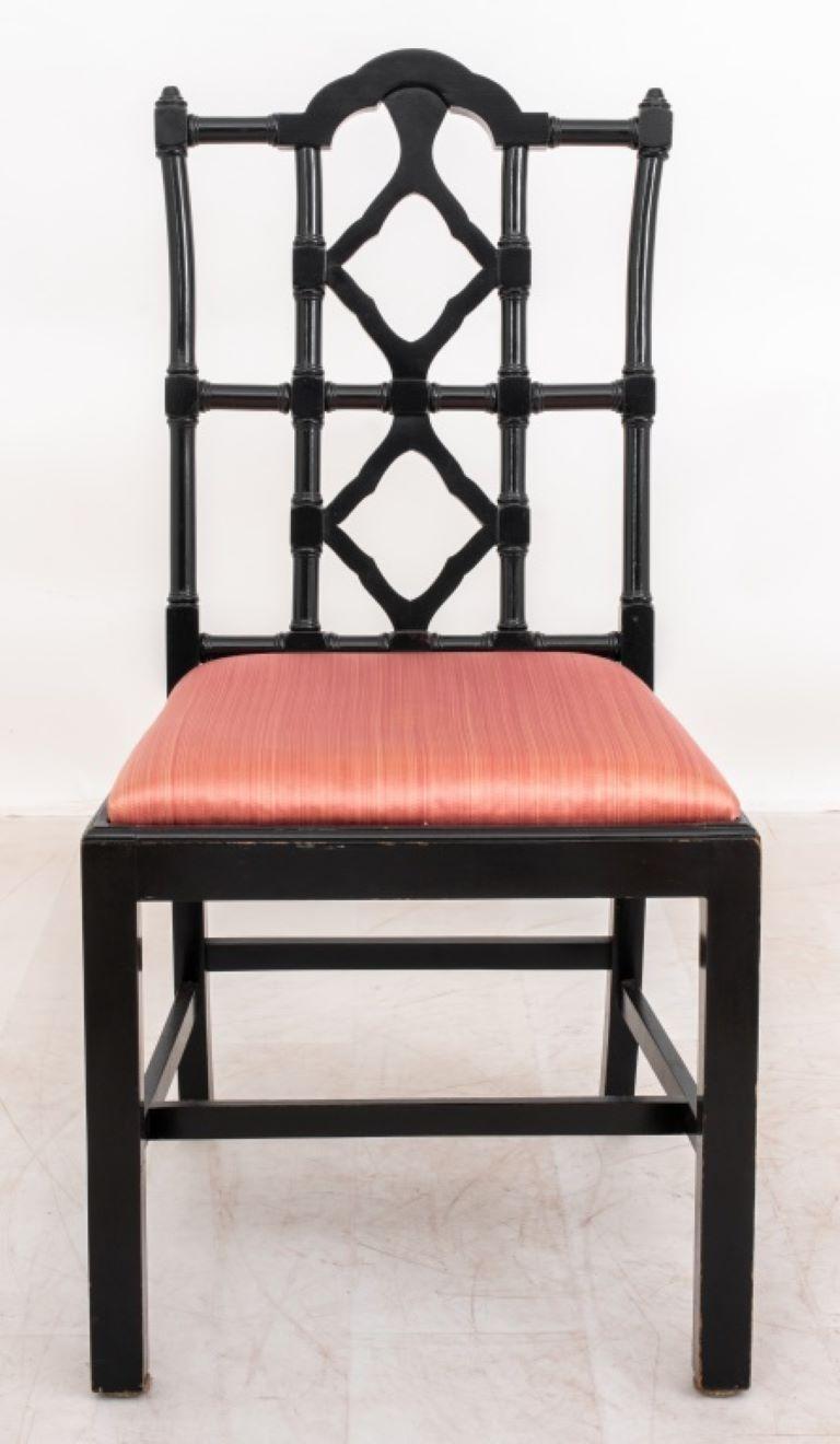 Maison Jansen Black Lacquered Side Chairs, six (6), each with ebonized fretwork backs and straight legs with raspberry pink drop in seats.

Dealer: S138XX