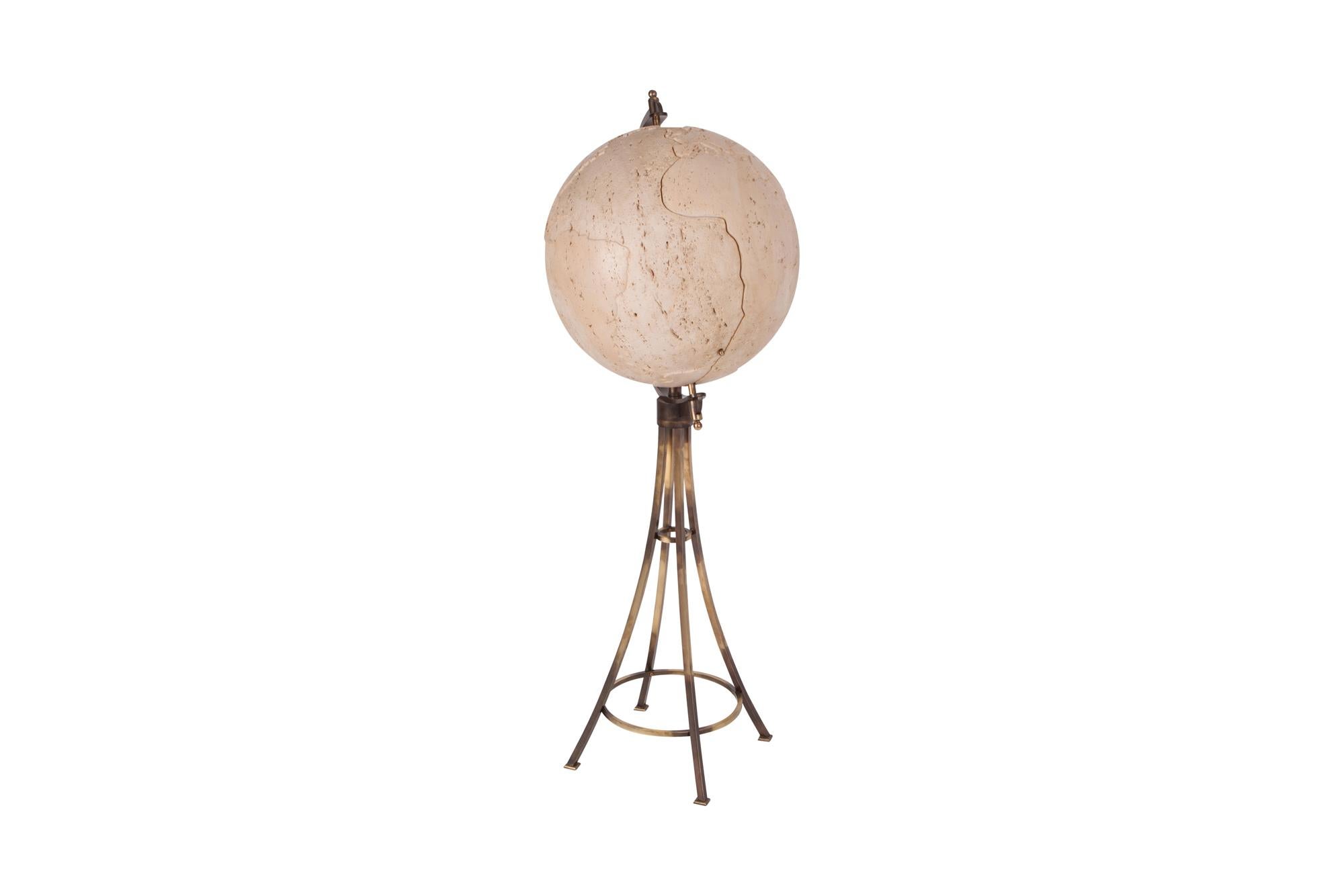 French bar unit, sculptural brass feet support the Moon. 

A small hidden brass lever opens up the globe presenting a bottle holding unit that can hold up to 12 large bottles.
A true midcentury eyecatcher.
Check out our Goldwood storefront for more