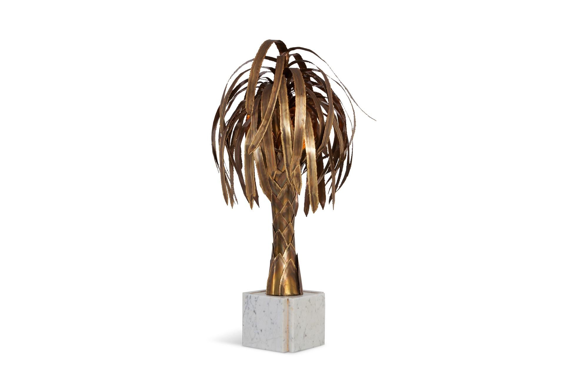 Hollywood Regency brass palm tree lamp by Maison Jansen, France 1970s.
Rare medium size model which can be used as a table or a floor lamp.

The white Carrara marble base add a touch a modern luxury.
A dimmer has been fitted on the