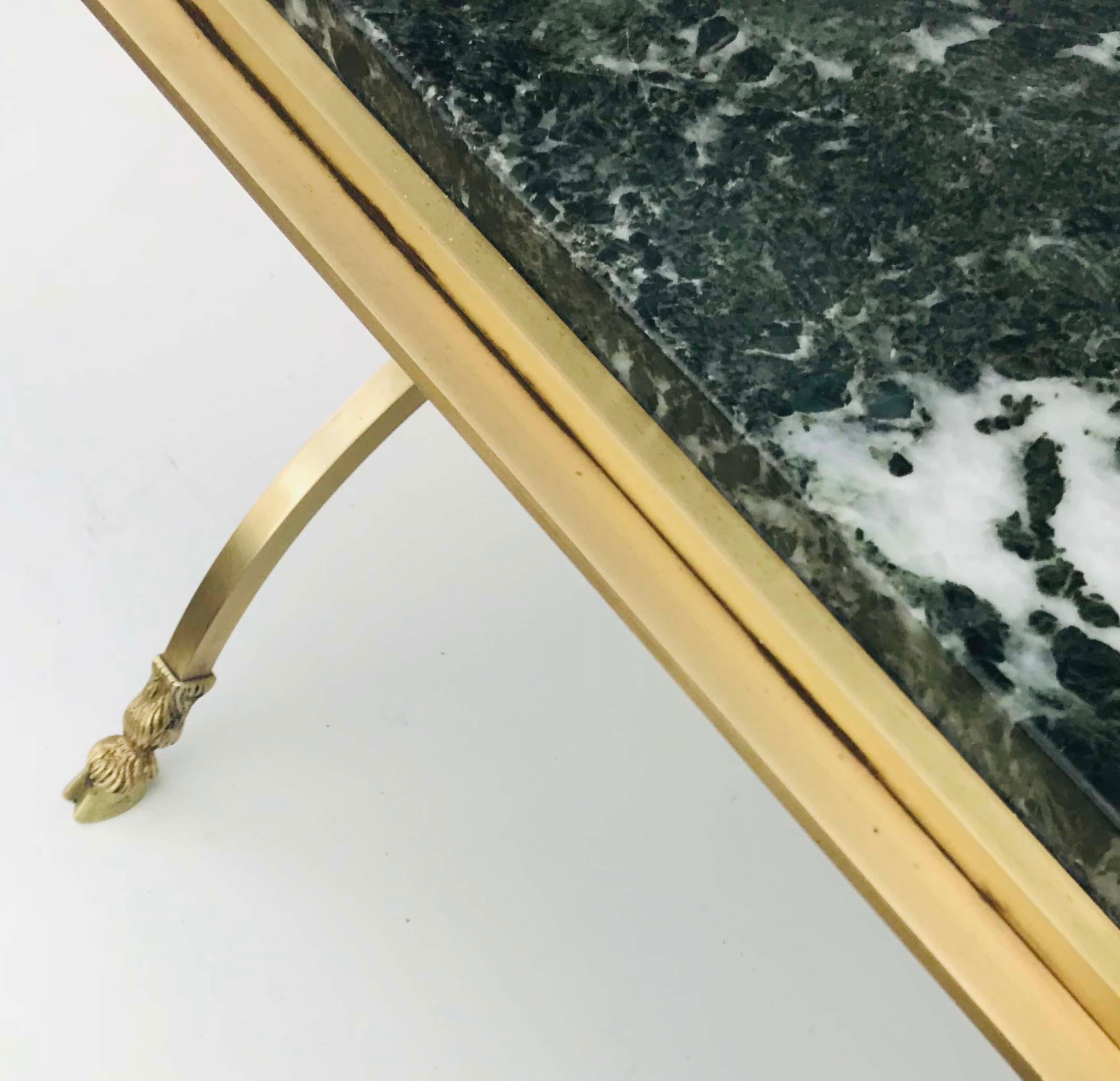 Superb coffee table by Maison Jansen…., brass and vert mer marble top. Very high quality made in France in 1950.
Totally restored and refinished.
 