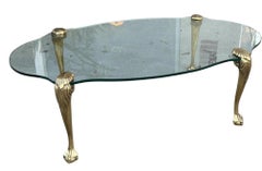 Mid Century Brass Claw and Ball Glass Cocktail Table