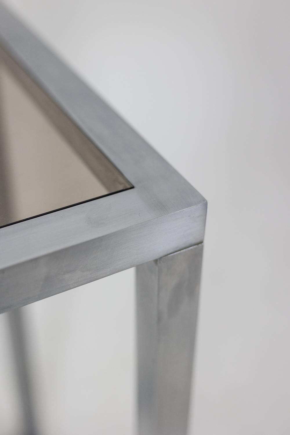 Maison Jansen. Konsole aus gebürstetem Aluminium. 1970er Jahre. 1