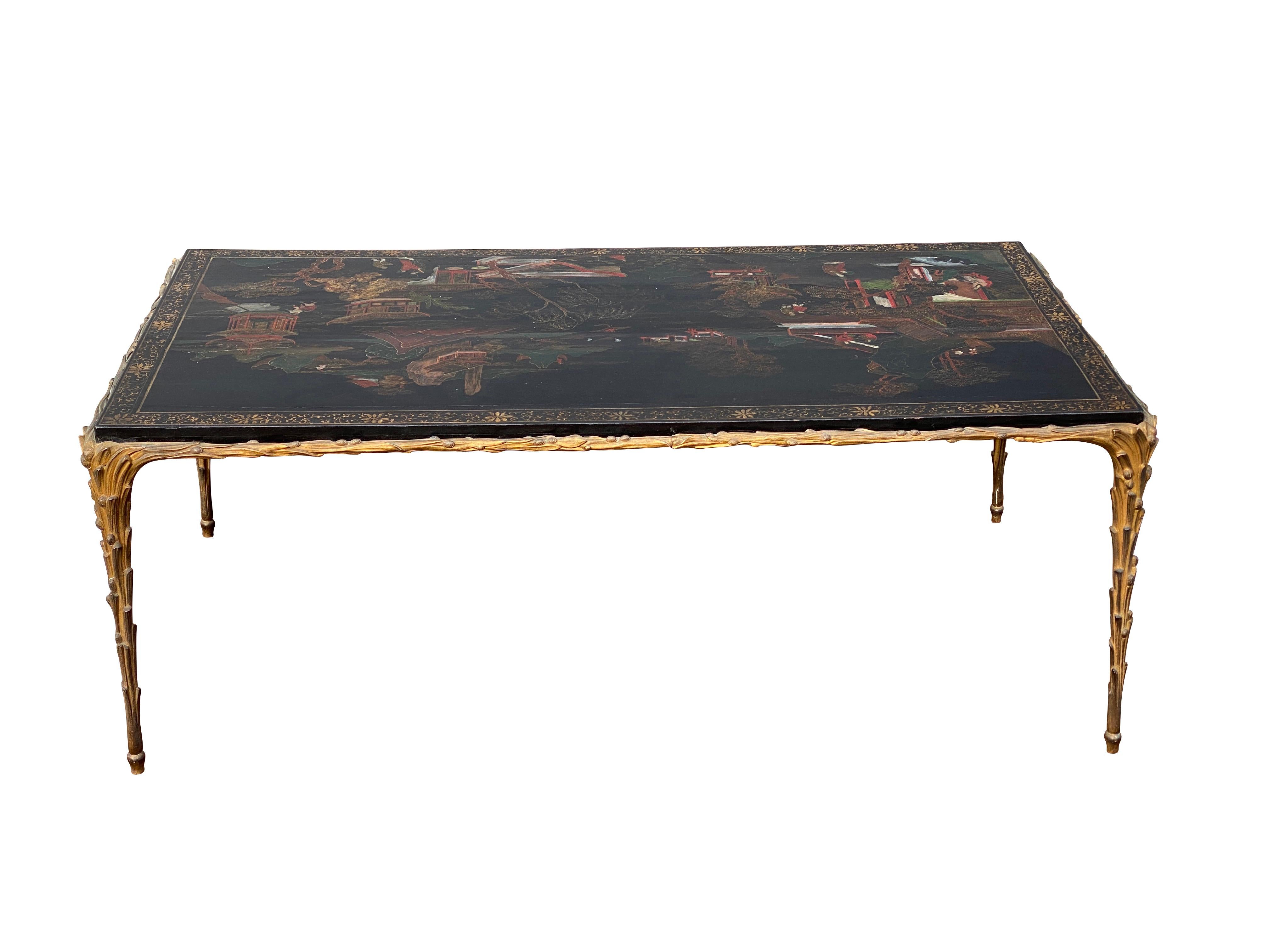Rectangular inset Asian inspired lacquered wood top set in a conforming laurel leaf and berry frame, raised on square tapered conforming legs.
Oxidation to the bronze frame. A nice subtle patina.