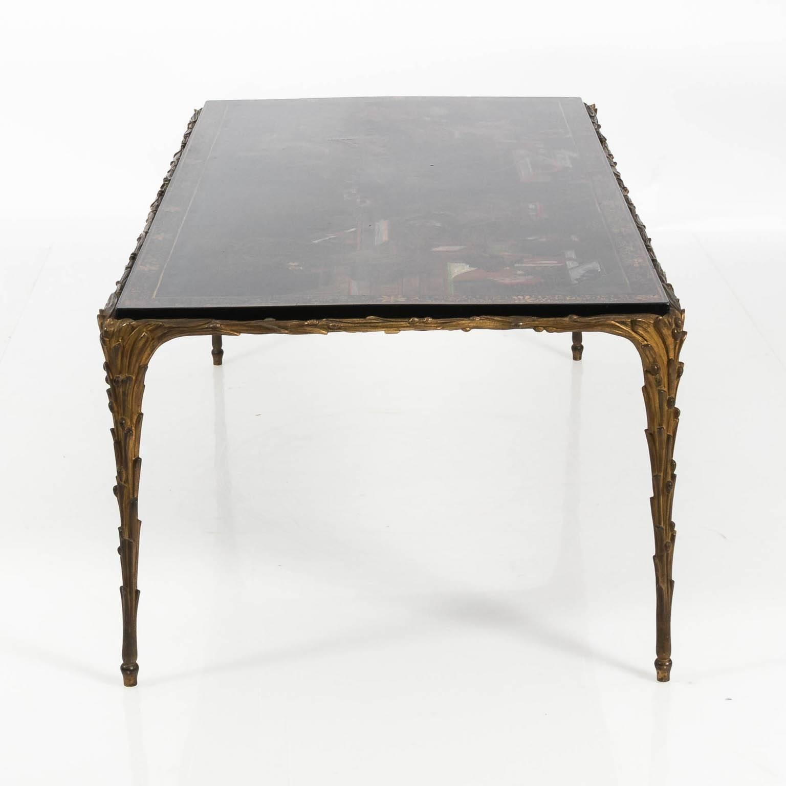 Original Maison Jansen coffee table with a bronze base that features an 18th century Chinese painted panel for the tabletop, circa 20th century.
 