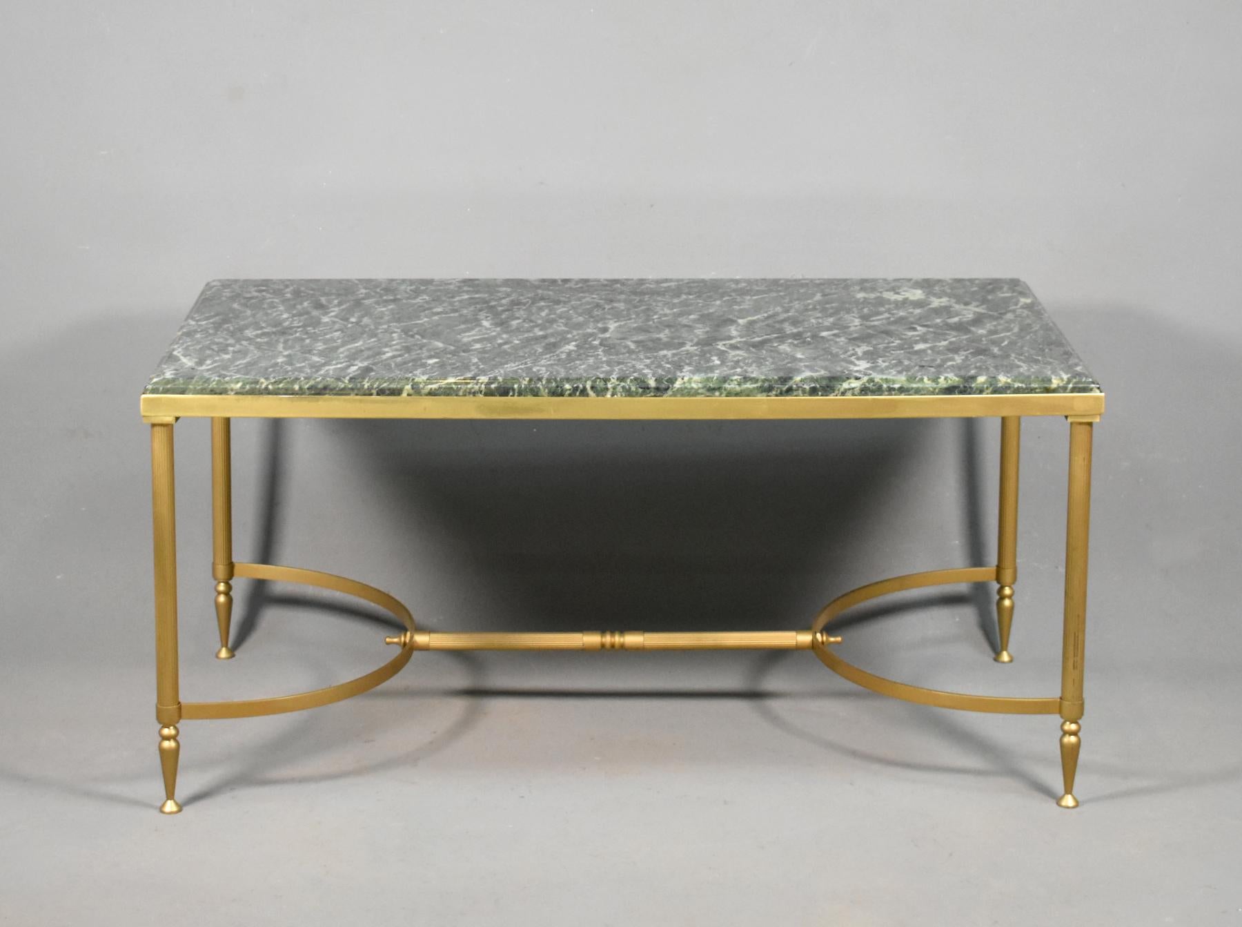 Maison Jansen coffee table with green marble top 

This stylish French coffee table of neoclassical design is attributed to the Paris-based, interior decoration and design house of Maison Jansen. 

Noted for quality and design, this piece is no