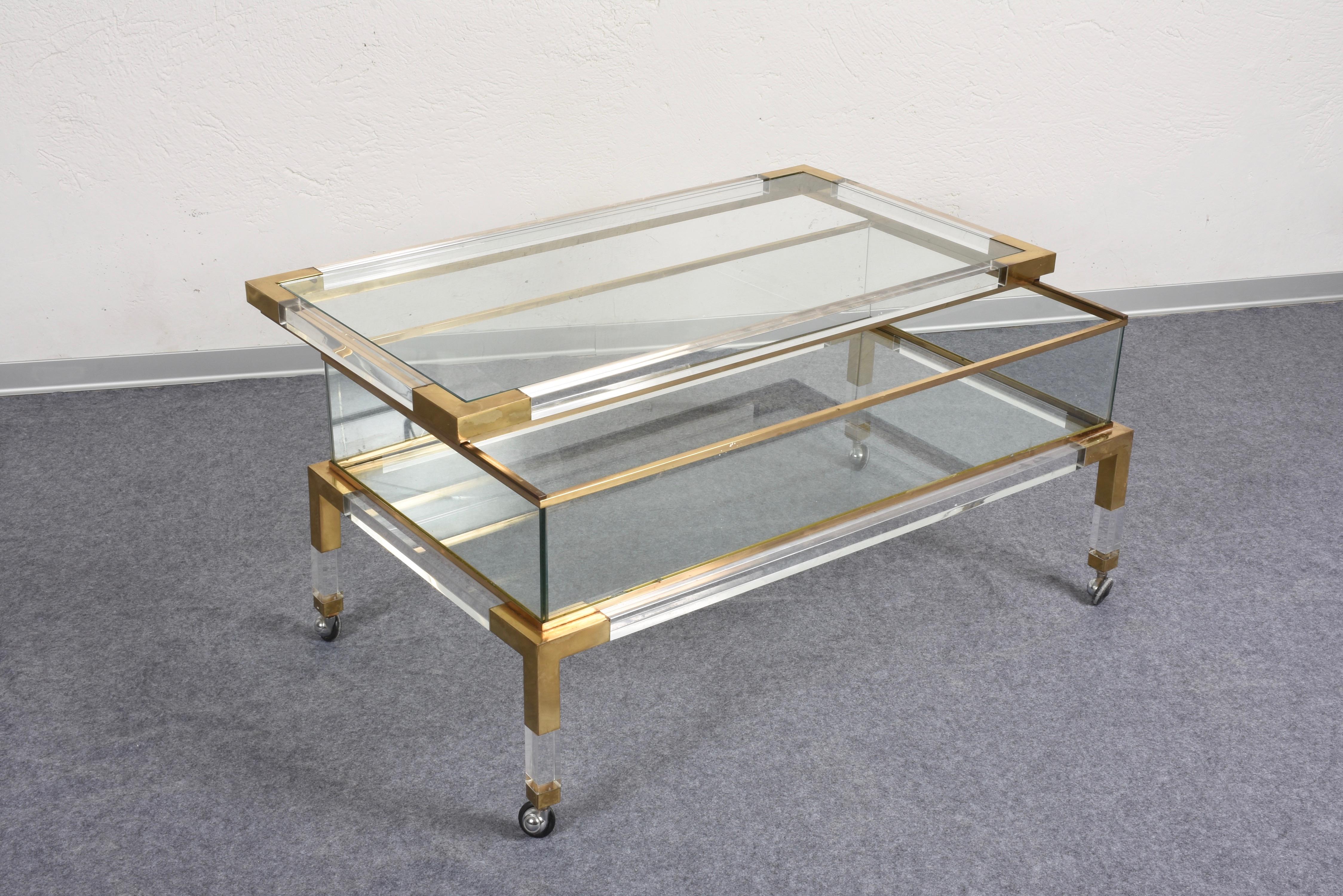 French Maison Jansen Coffee Table with Sliding Shelf Lucite and Brass, France, 1970s