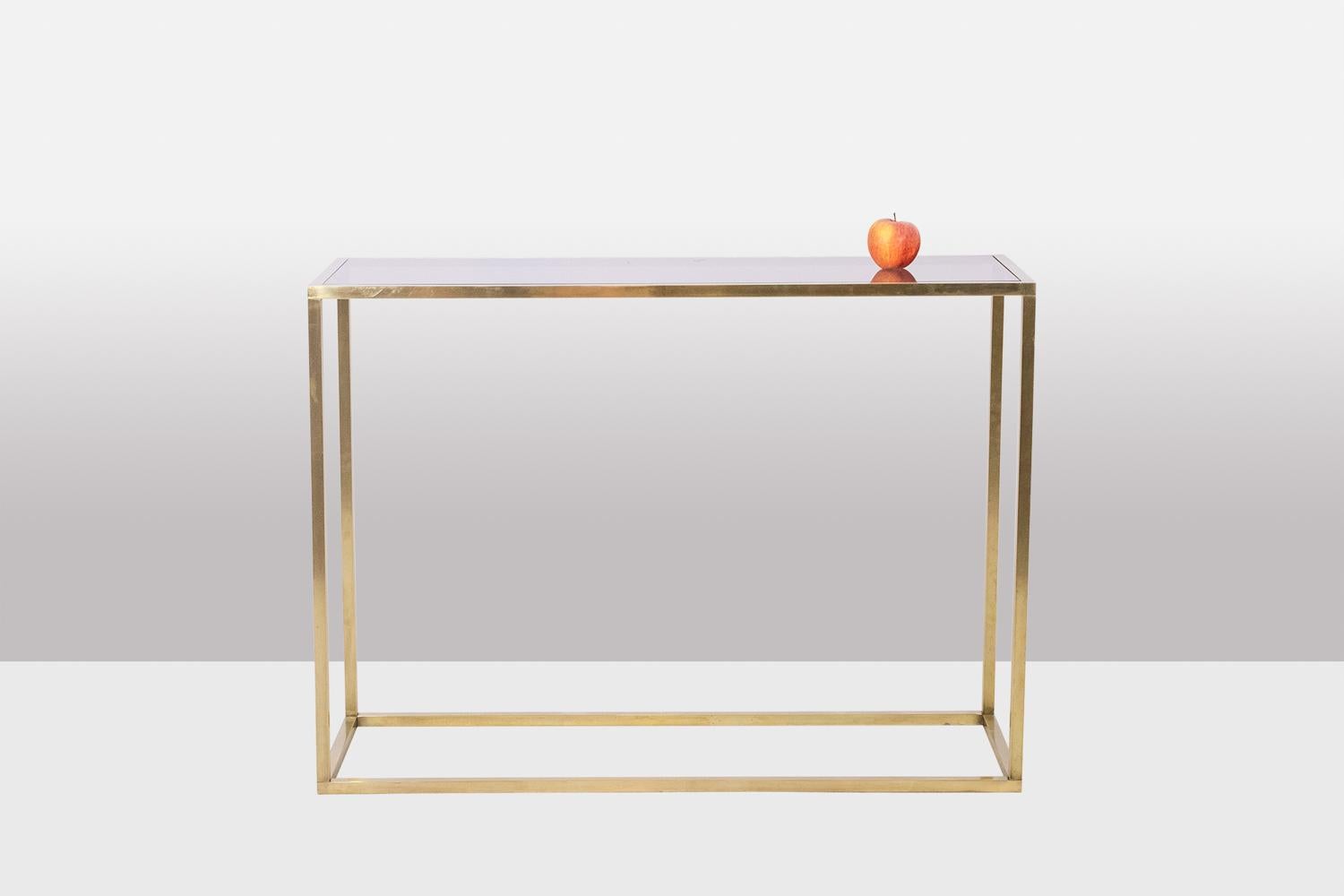 Maison Jansen, by.

Console in gilded brass, rectangular in shape, with its smoked glass top.

French work realized in the 1970s.

Dimensions: H 80 x W 110 x D 40 cm

Reference: LS6175609P