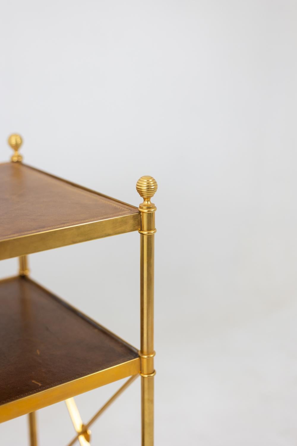 Brass Maison Jansen. Console in gilded brass and tan leather. 1970s. For Sale