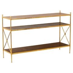 Vintage Maison Jansen. Console in gilded brass and tan leather. 1970s.