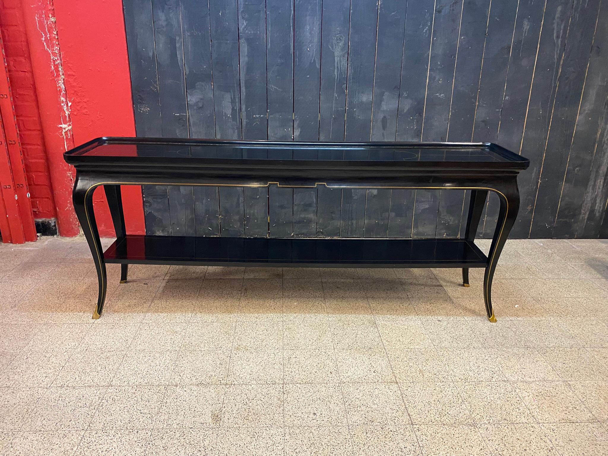Maison Jansen, exceptional large neo classic console table in blackened pearwood and brass fillet circa 1950/1960
Another console of the same model, but larger is also offered for sale in another ad.
Prestigious provenance.
