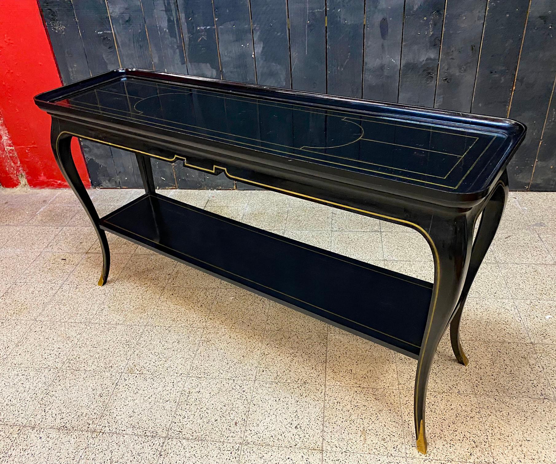Maison Jansen, exceptional neo classic console table in blackened pearwood and brass fillet circa 1950/1960
Another console of the same model, but larger is also offered for sale in another ad.
Prestigious provenance.