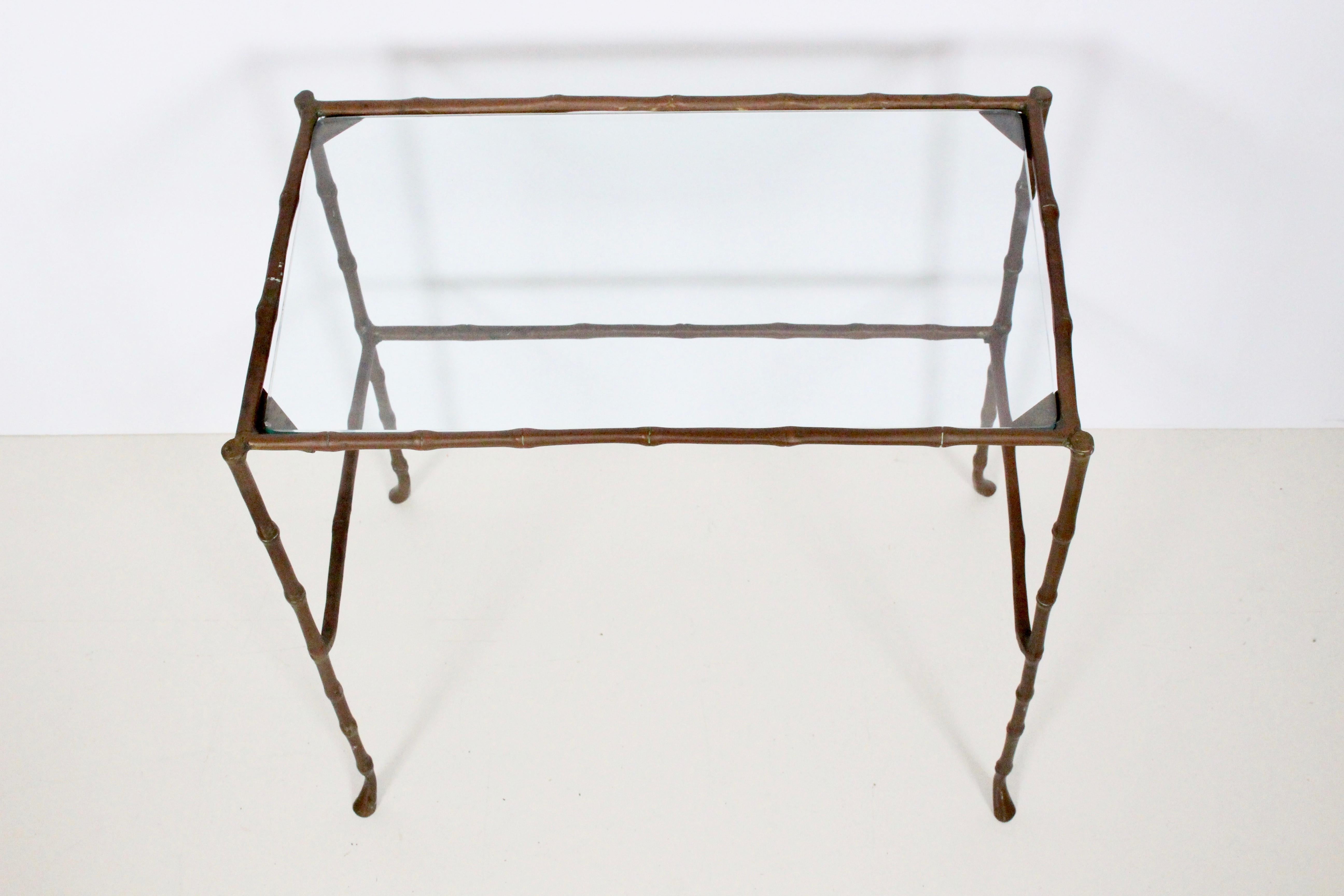 1950's Maison Jansen brass sofa table, side table, plant table. Featuring a sturdy rectangular form in solid Brass with original vintage patina and 1/4 glass. Great for small spaces. For indoor or outdoor use.
  