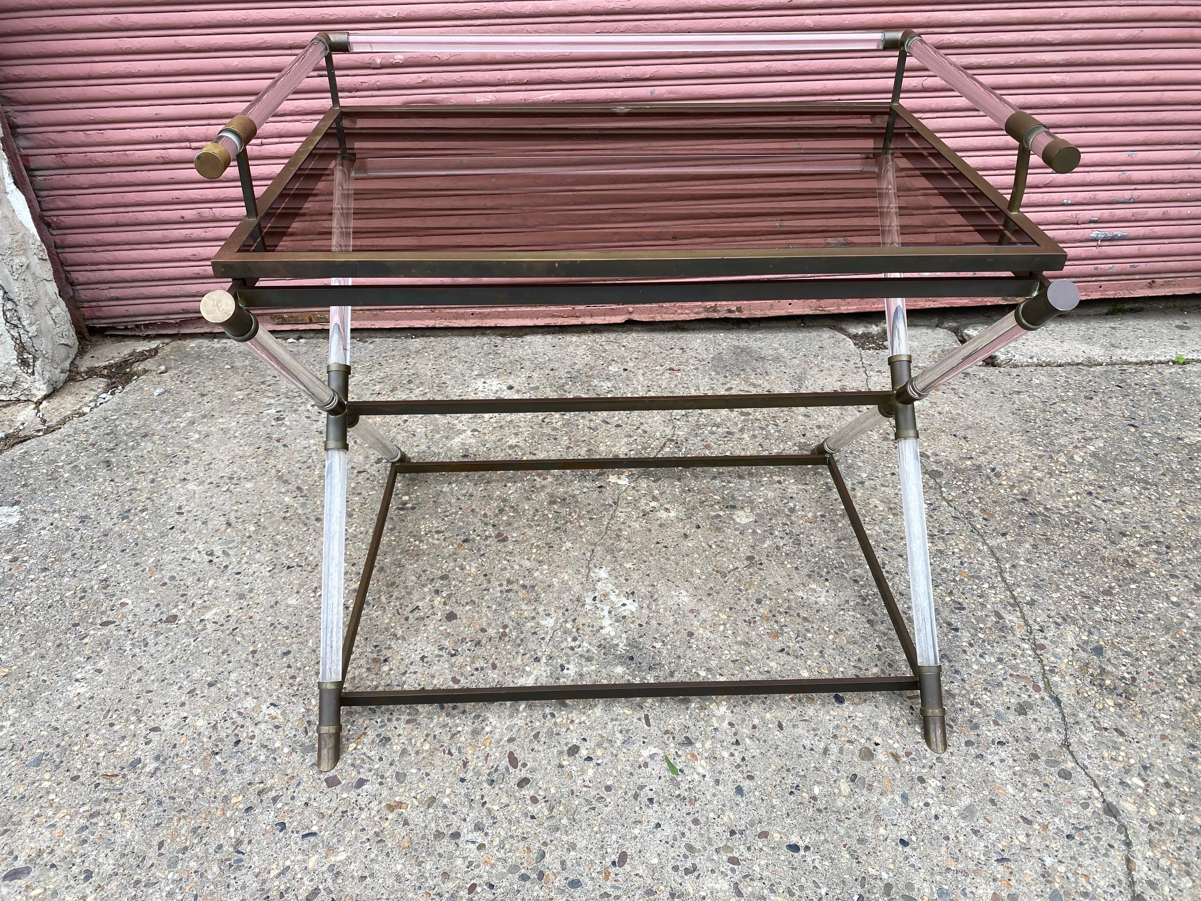 Attributed to Maison Jansen Brass, Lucite and Glass Serving Table.  Top tray lifts off to serve easily.  Glass Surface is 29