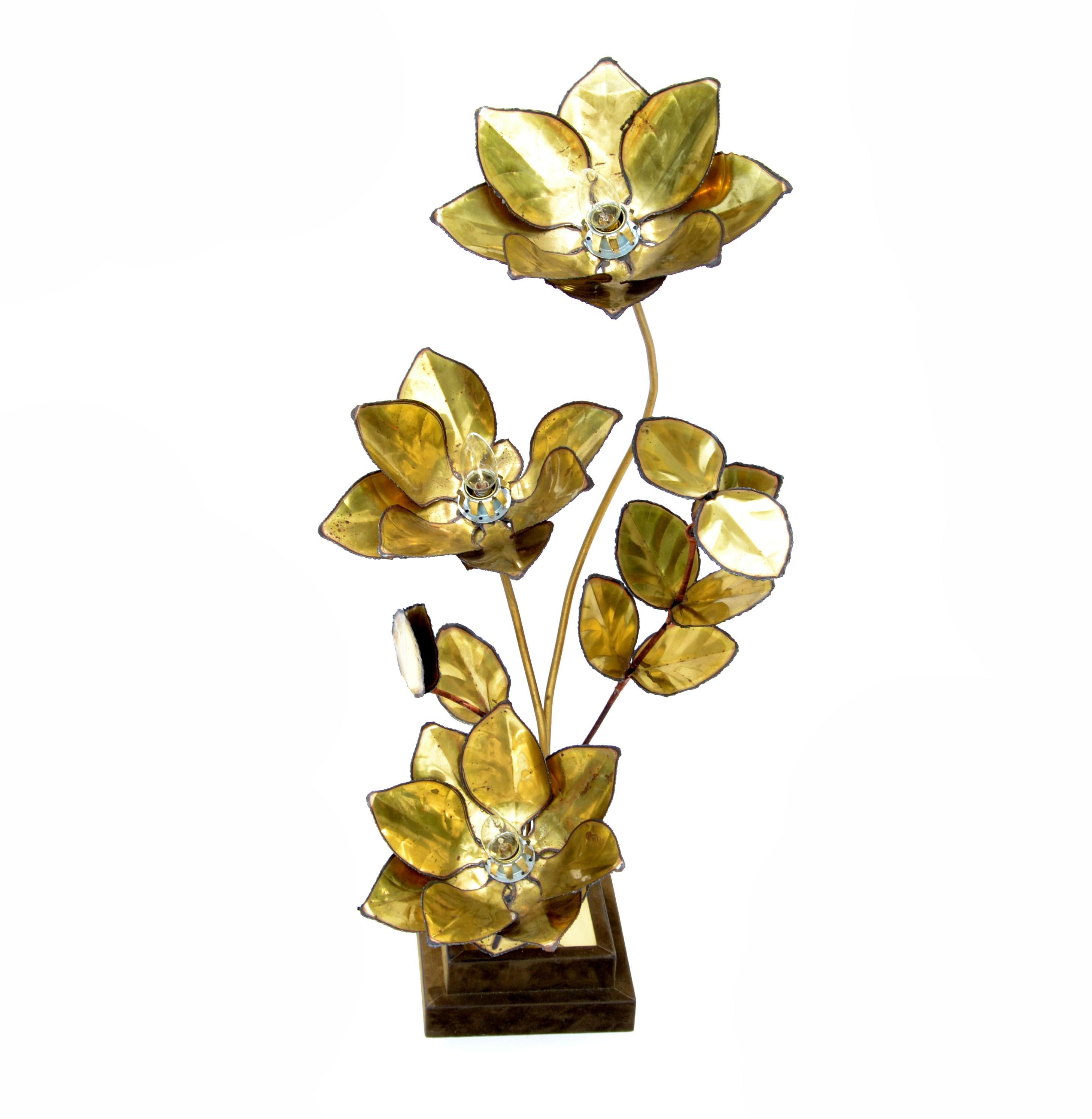 Maison Jansen French 3-light cut brass flower table lamp on a brown velvet covered base.
Uses 3 light bulb with max. 40 watts 
Great as a decorative object, stunner done craftsmanship.
