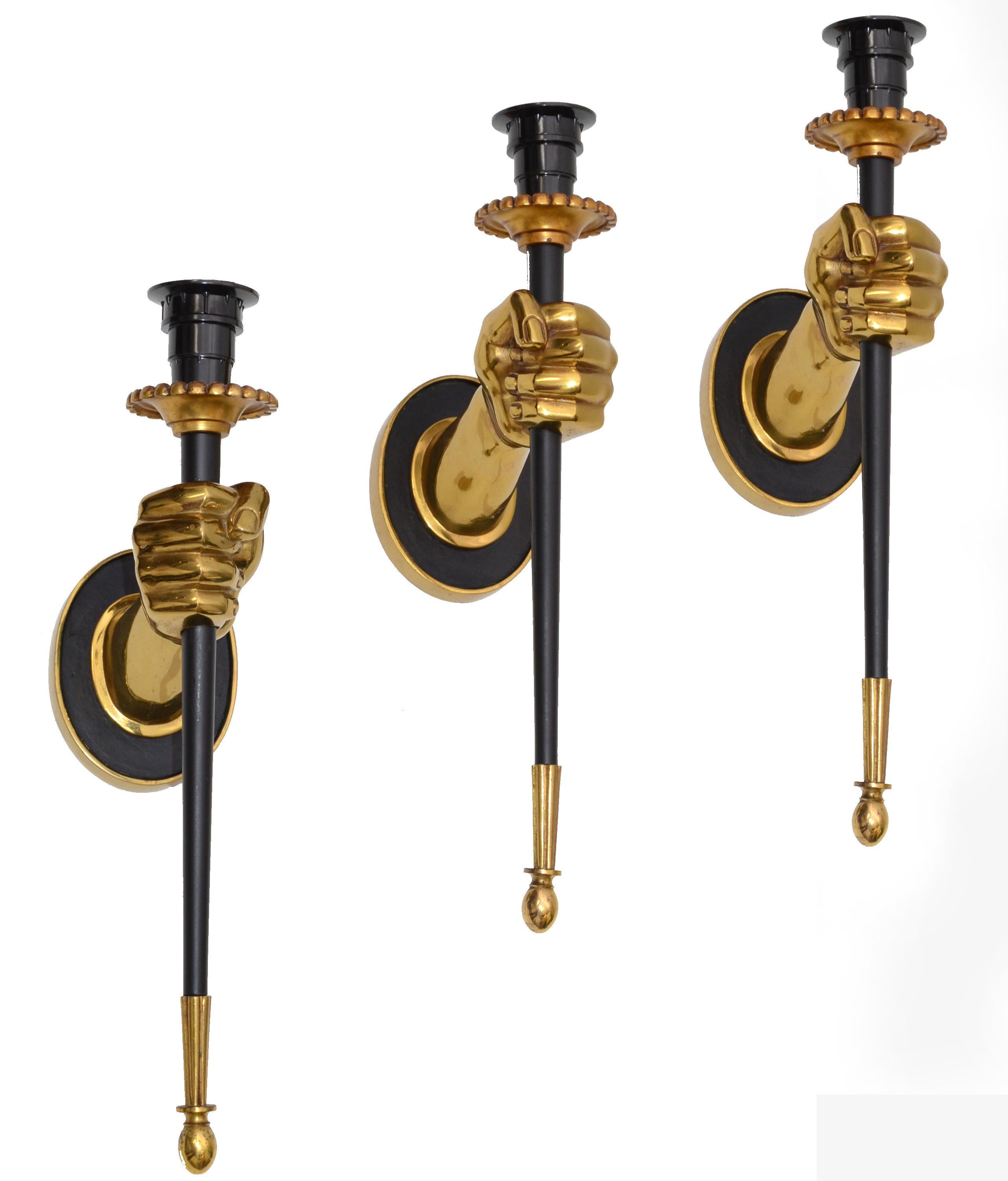 Impressive set 3 of sconces by Maison Jansen figuring a bronze hand holding a black lacquered torch.
One light, 60 watts max. US rewired.
Dimension without shade: 14 inches height, 3 1/4 inches width, 6 inches depth.
Projection back plate 4.5 H,