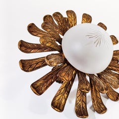 Maison Jansen. Montatura da incasso in bronzo dorato con foglie di palma, Francia, anni '50