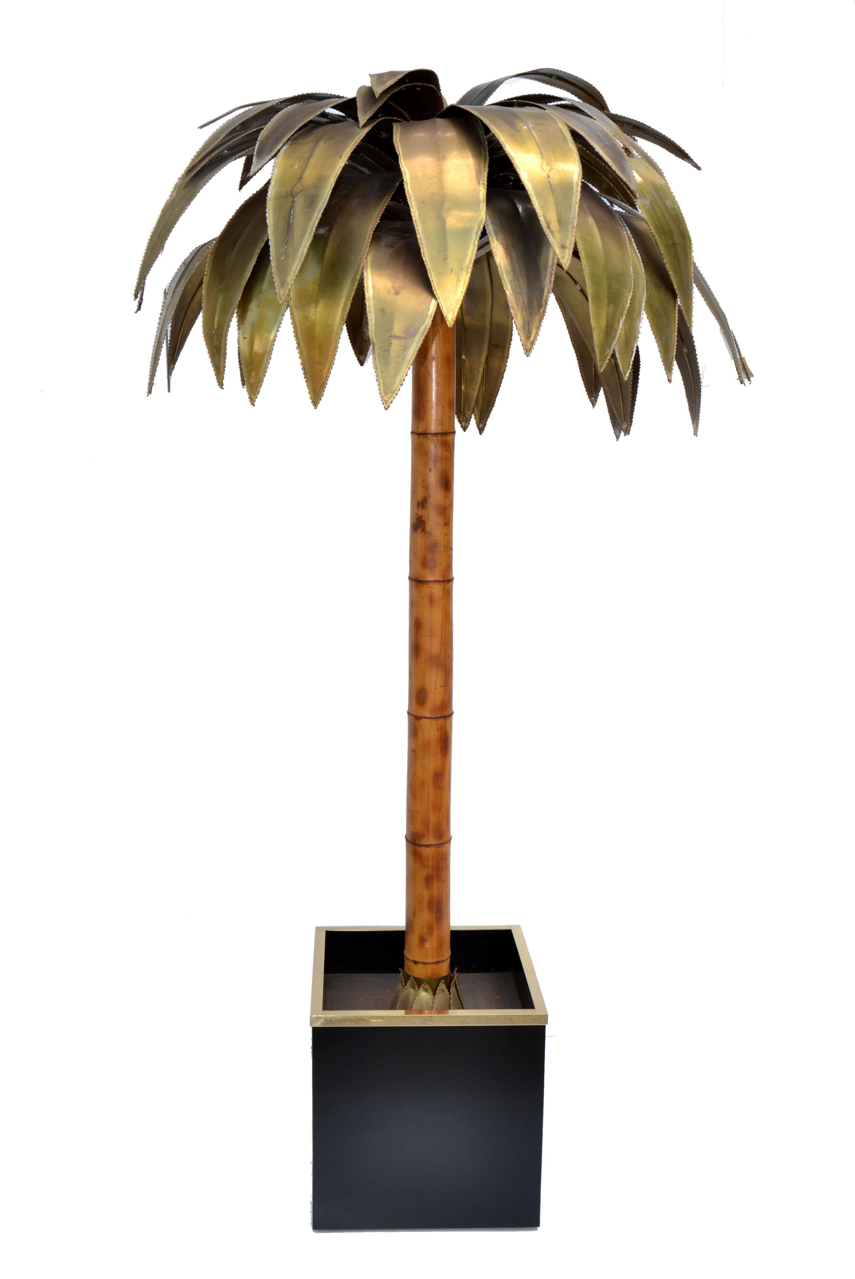 One of a Kind Maison Jansen designed 7ft H bronze, brass and bamboo palm tree floor lamp made in 1965.
Provenance: Palace Hotel in La Baule, France.
Wired for US and in working condition, takes five-light bulbs, One Regular 100watt bulb on Top and