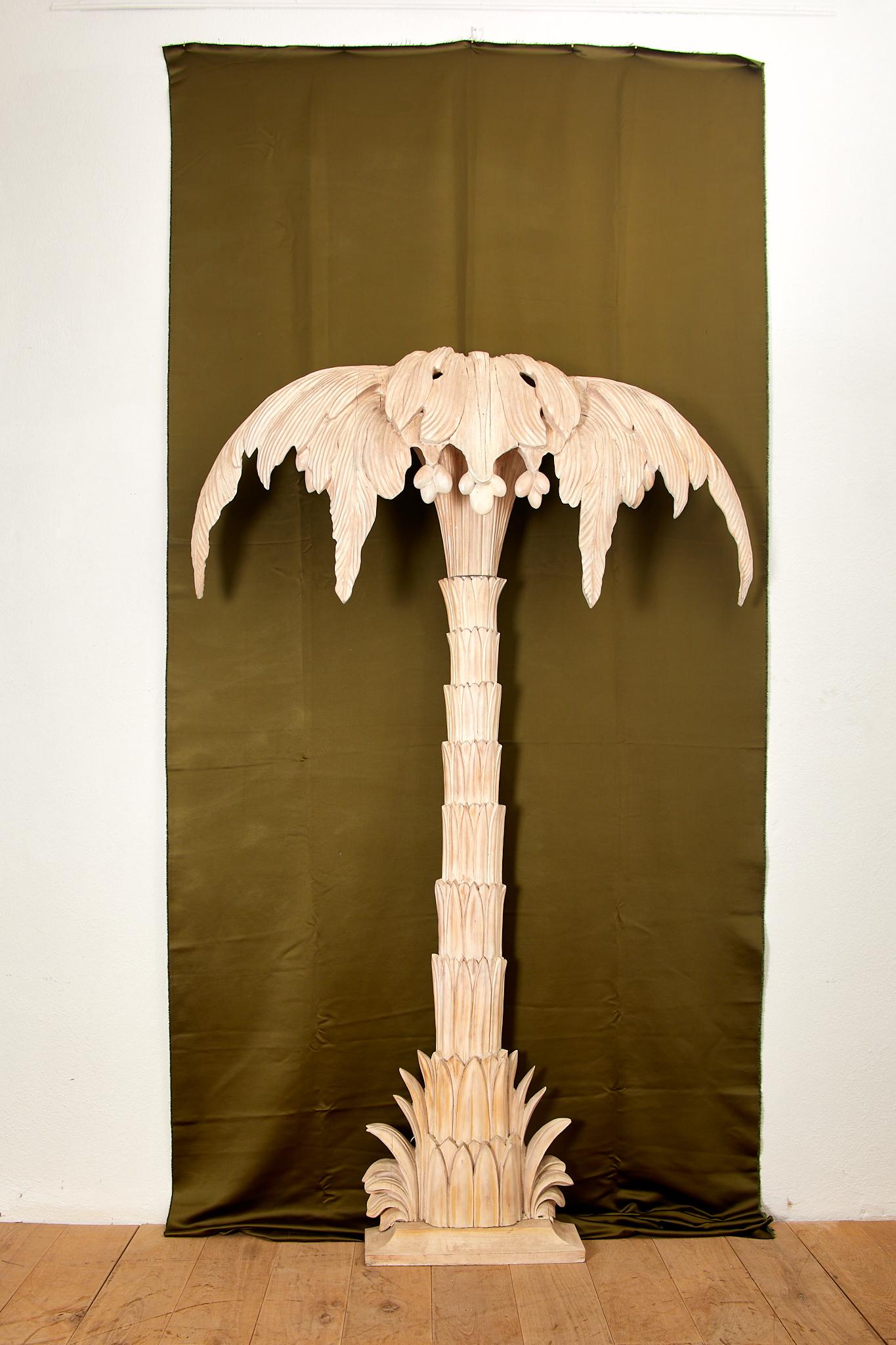 Maison Jansen,
Large carved wooden wall lamp in the shape of a palm tree with two lights,
circa 1960, France.
Height 2m20, width 1m35, depth 0.30 cm.
