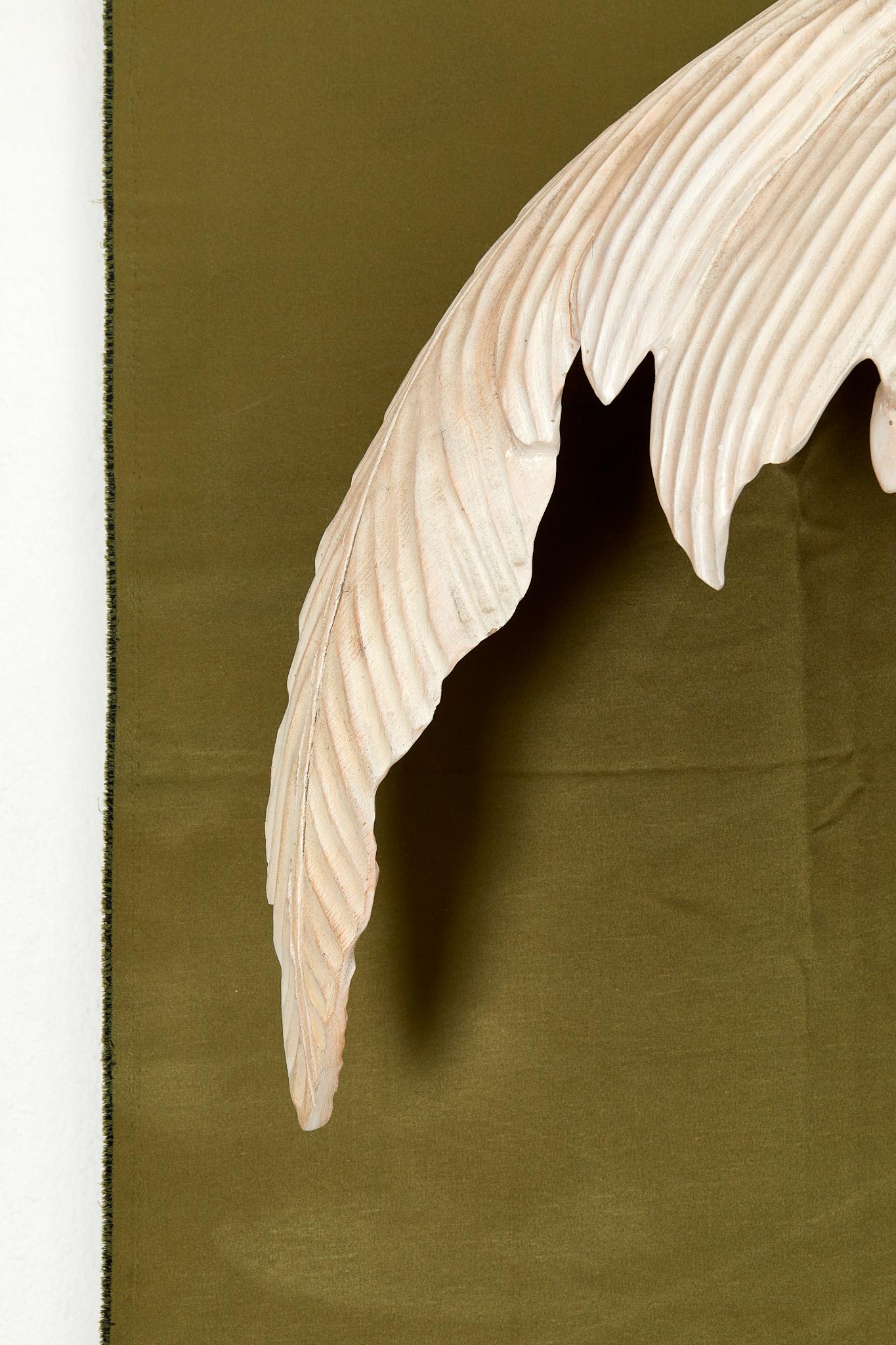Wood Maison Jansen, important wood sculpted sconce, circa 1960, France.